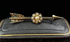 Antique Arrow and flower brooch, 9k gold and pearl