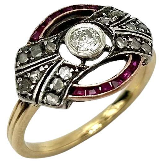 An old gold ring in the Art Deco style made of yellow gold (approx. 0.700) with silver elements (0.990).

Made in the 1920s in Germany.

A centrally placed round diamond in an 