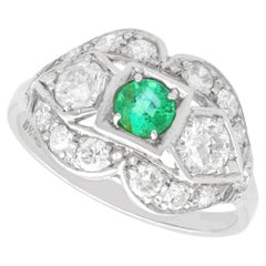Antique Art Deco 0.40 Carat Emerald 1.52 Carat Diamond Platinum Ring Circa 1920