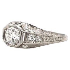 Antique Art Deco 0.60 Carat Diamond Platinum Filigree Ring