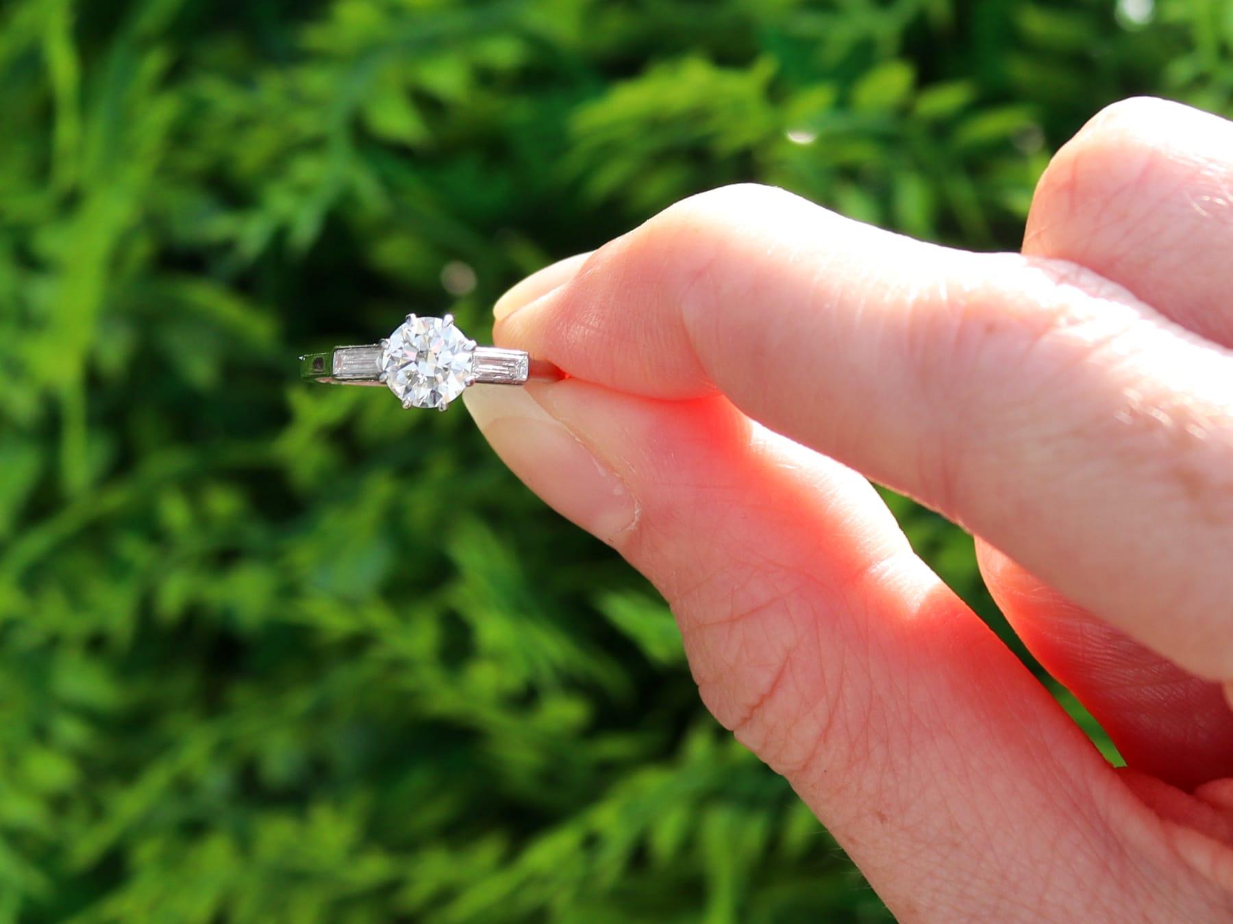 A stunning, fine and impressive antique Art Deco 0.91 carat diamond solitaire ring in platinum; part of our antique engagement ring collections.

This stunning, fine and impressive antique Art Deco diamond solitaire ring has been crafted in