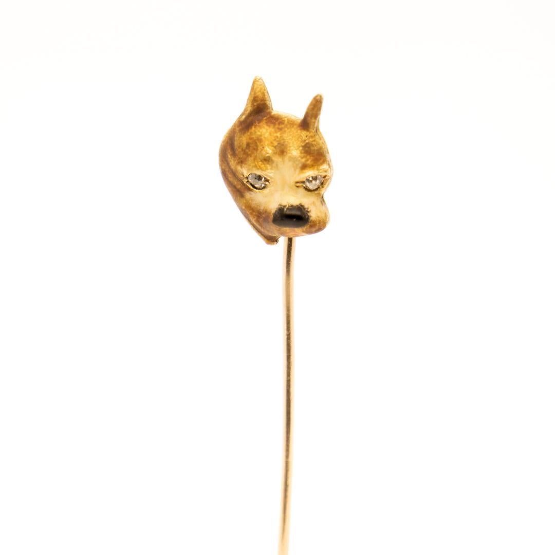 A fine antique Art Deco stickpin.

In 10k gold.

The head of the pin consisting of an enameled bulldog with pointed ears, single-cut diamond eyes, and enamel decoration throughout.

Simply a wonderful early stick pin!

Date:
Early 20th