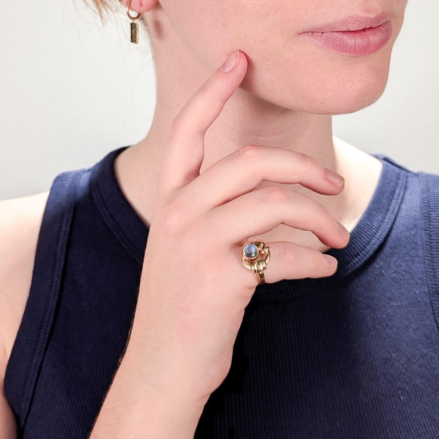 A fine Art Deco ring.

In 10k rose and yellow golds.

With a stylized buckle head and a bezel set moonstone cabochon.

Simply a wonderful Deco ring!

Date:
Early 20th Century

Overall Condition:
It is in overall fair, as-pictured, used estate