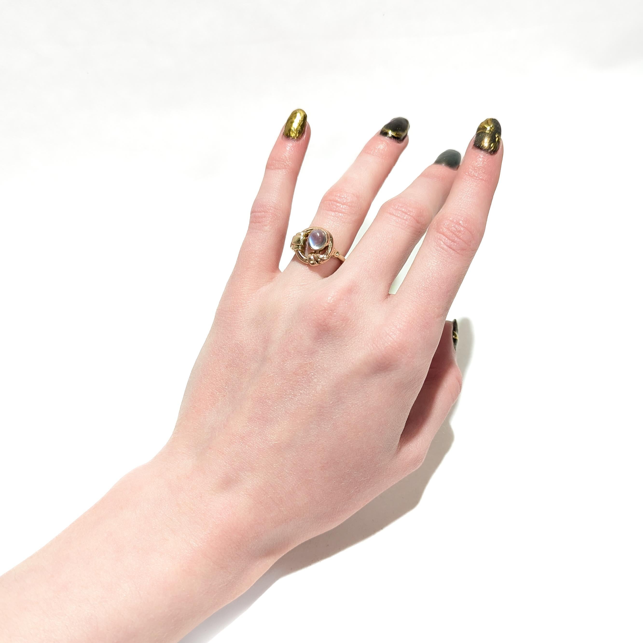 Women's Antique Art Deco 10k Rose & Yellow Gold Buckle Ring with a Moonstone Cabochon For Sale