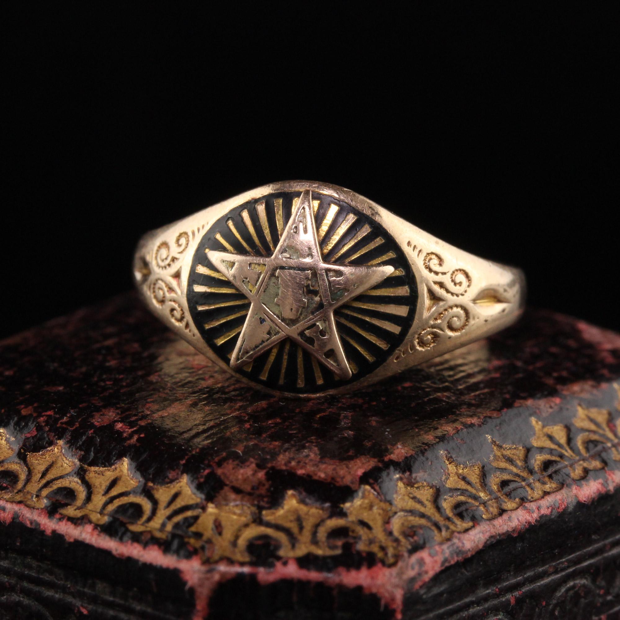 Beautiful Antique Art Deco 10K Yellow Gold Masonic Black Enamel Ring. This classic band is crafted in 18k yellow gold. This beautiful ring is crafted in 10k yellow gold. The center has a start with black enamel lines coming out of it into side