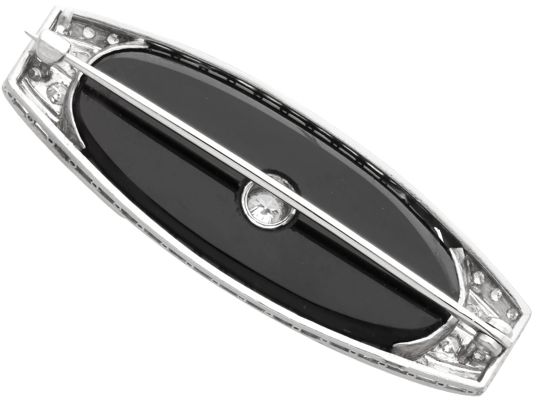 Women's or Men's Antique Art Deco 11.20Ct Black Onyx and 0.91Ct Diamond, Platinum Brooch For Sale