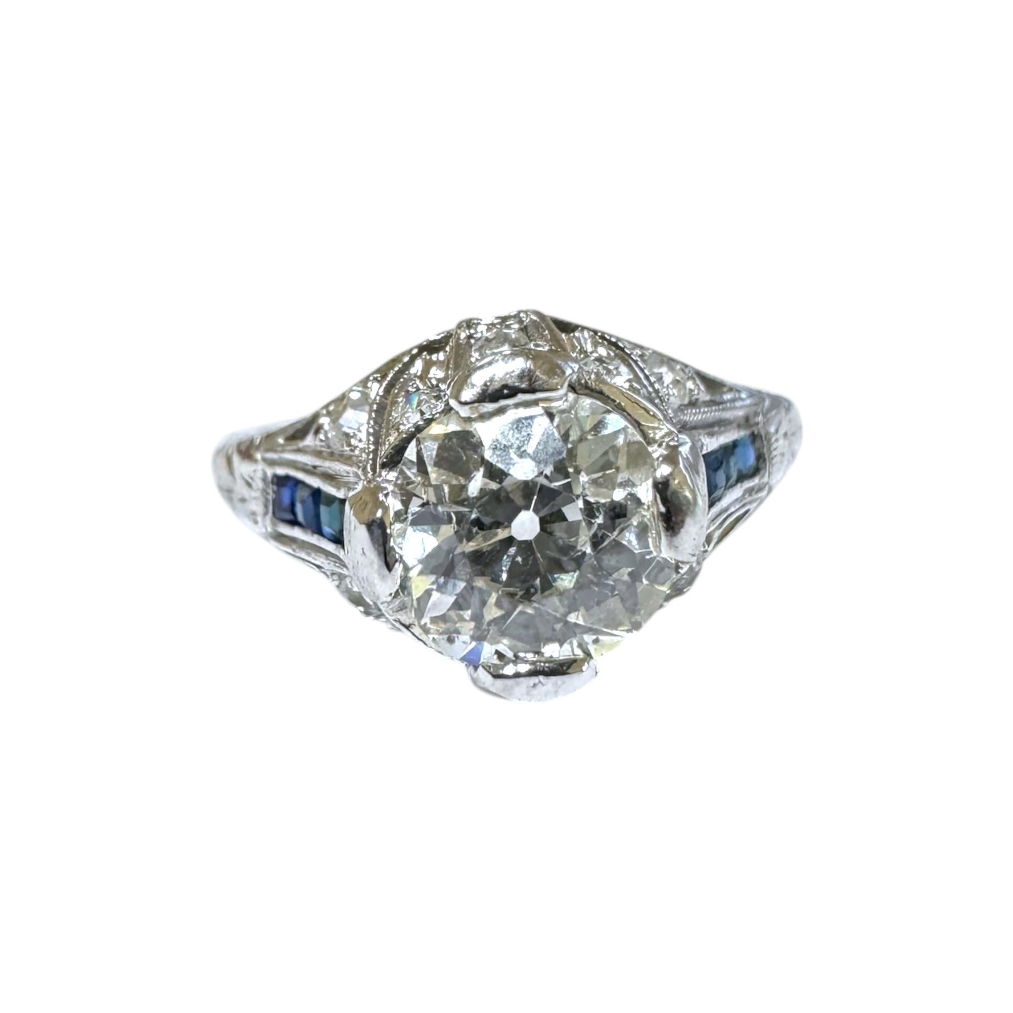 Bague de fiançailles Art déco ancienne en platine avec diamant de 1,25 carat et saphir en vente 1