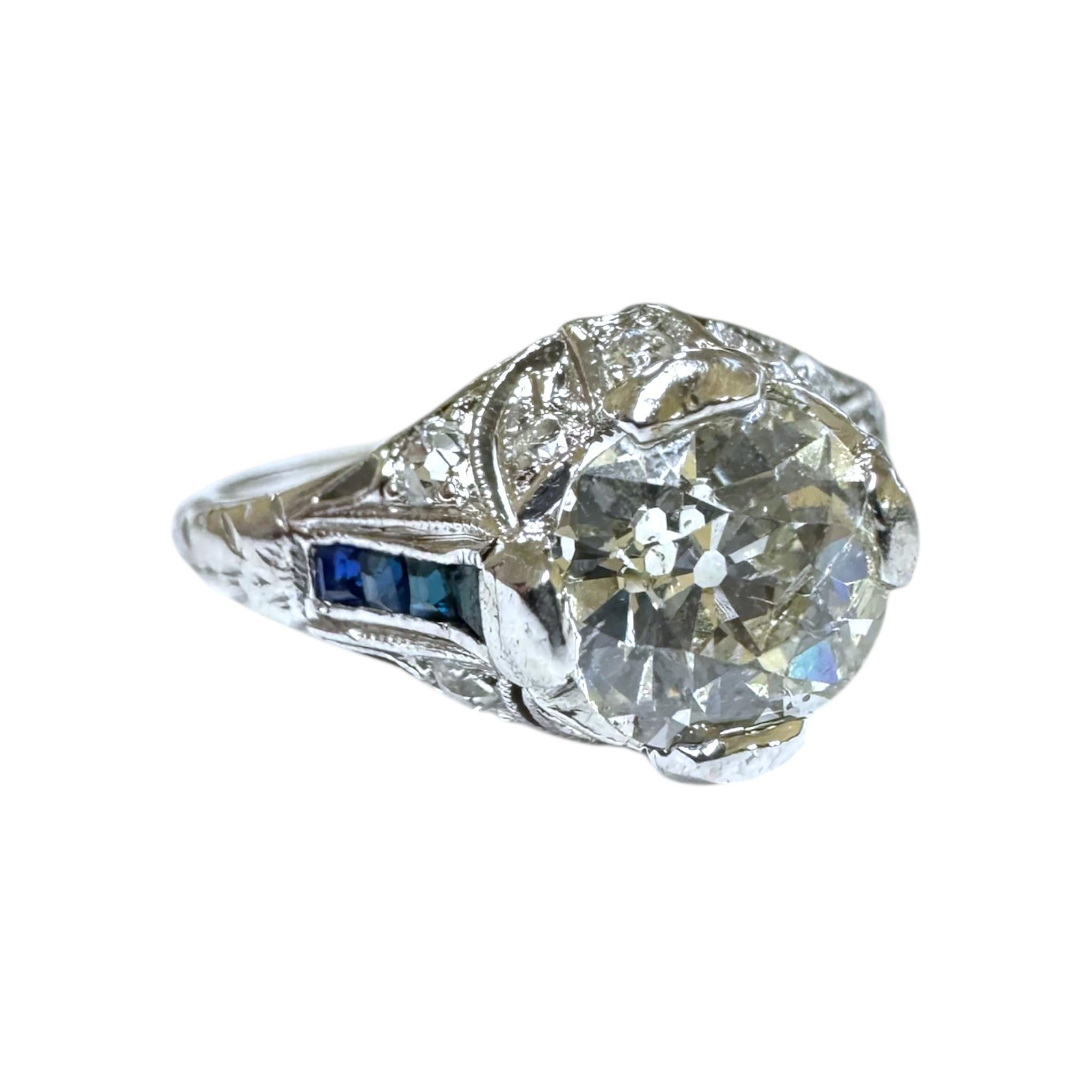 Bague de fiançailles Art déco ancienne en platine avec diamant de 1,25 carat et saphir en vente 3