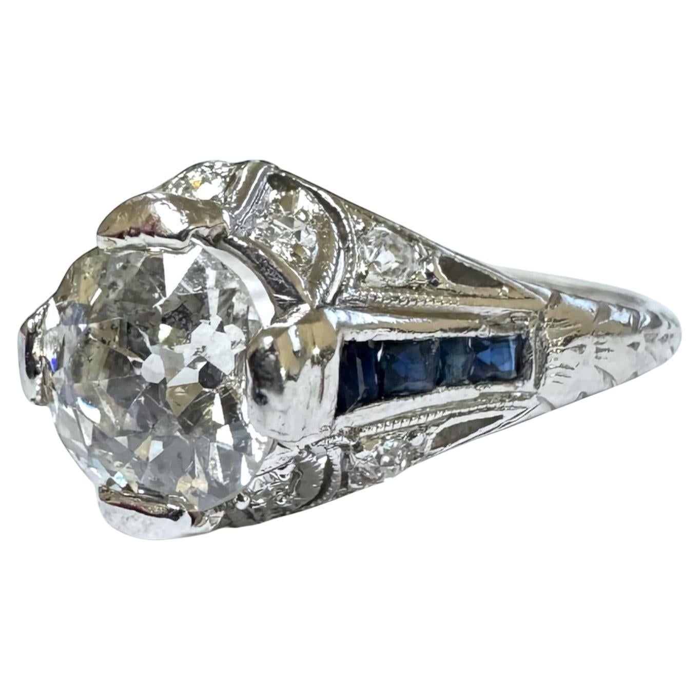 Antique Art Deco 1.25 Carat Diamond and Sapphire Platinum Engagement Ring