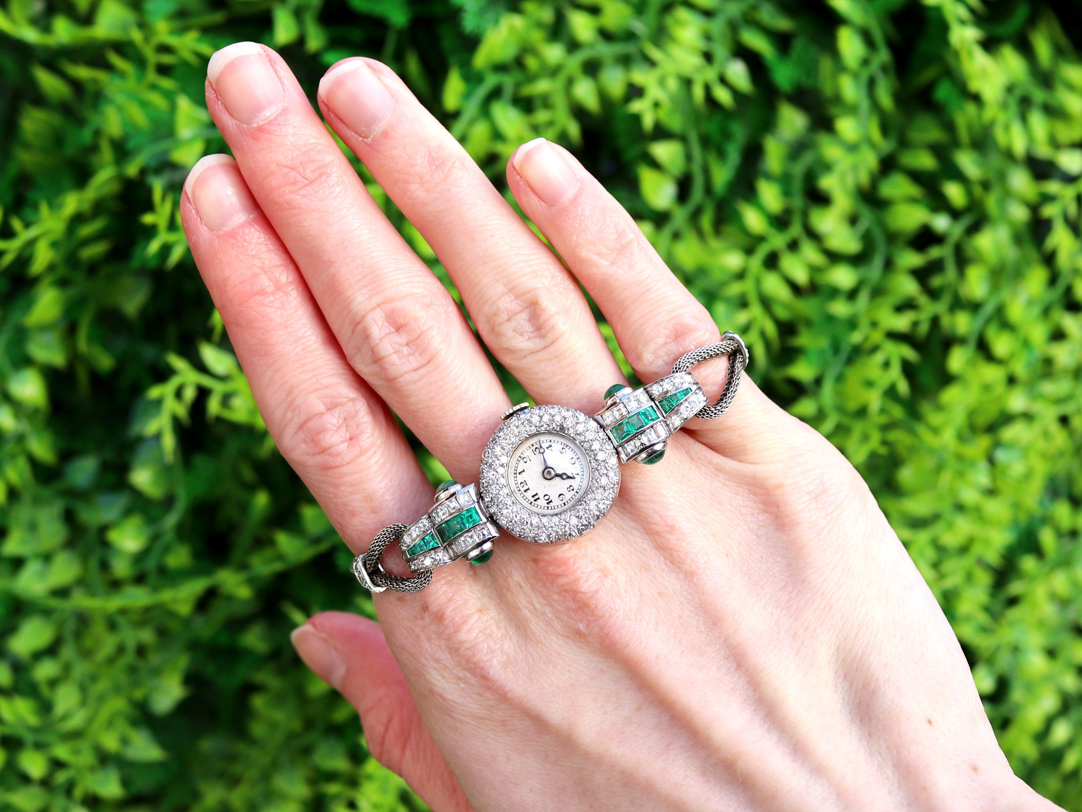 A stunning, fine and impressive antique Art Deco 1.25 carats emerald, 2.02 carats diamond and platinum watch with a 9 k white gold strap; part of our diverse ladies cocktail watch and emerald jewelry collections.

This stunning antique watch has