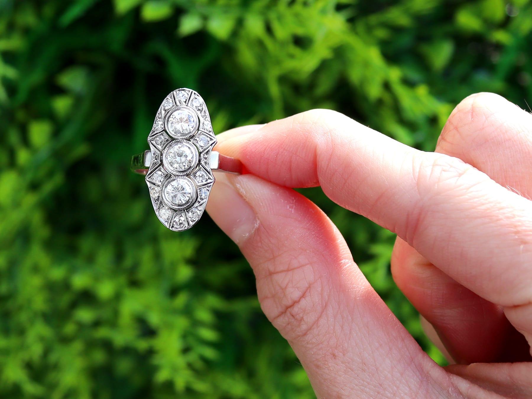 A stunning, fine and impressive antique 1.32 carat diamond and 14 karat white gold ring; part of our diverse collection of Art Deco jewelry.

This stunning, fine and impressive antique diamond ring has been crafted in 14k white gold.

The pierced
