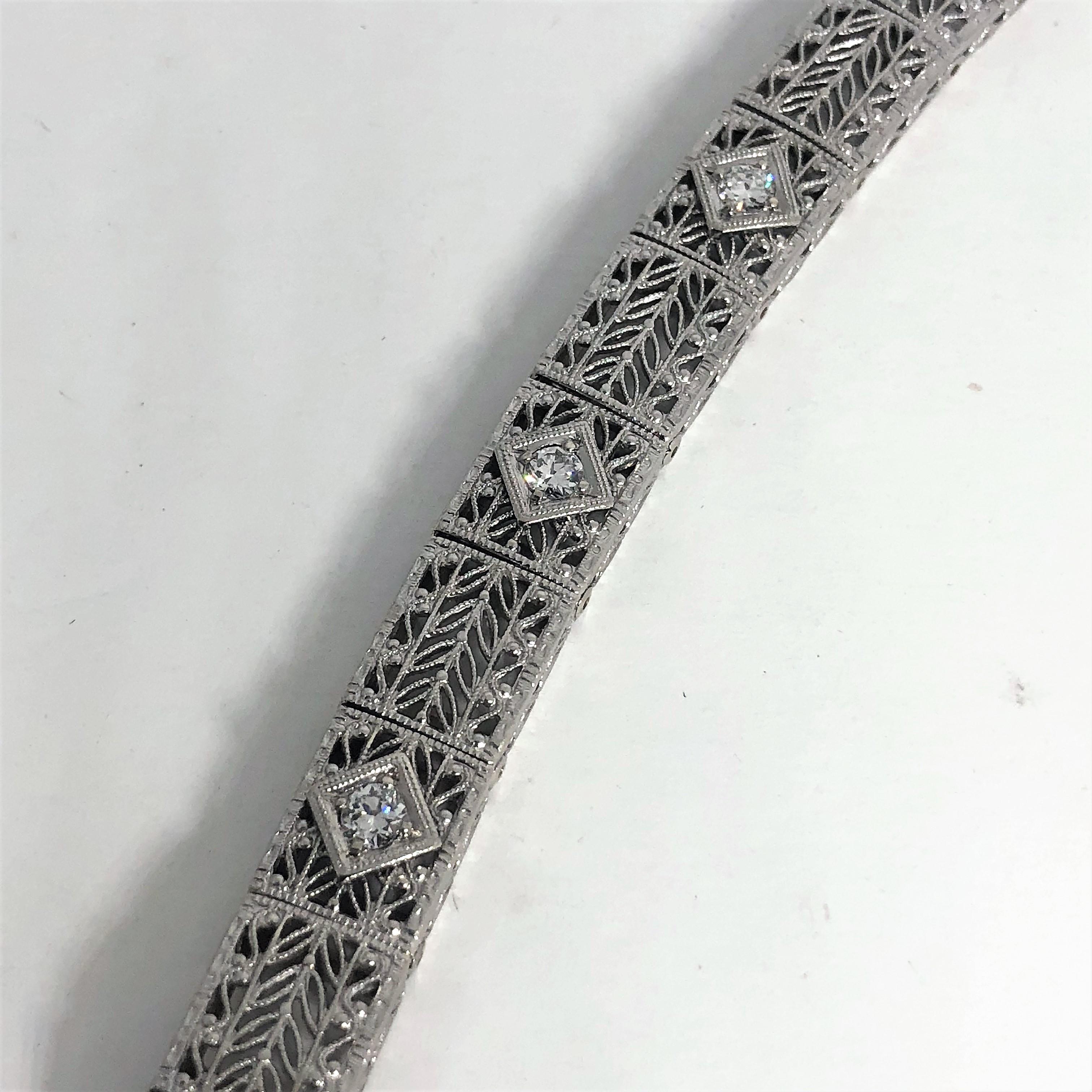 Antique Art Deco 14 Karat White Gold Diamond Three-Stone Filigree Bracelet In Excellent Condition In Mansfield, OH