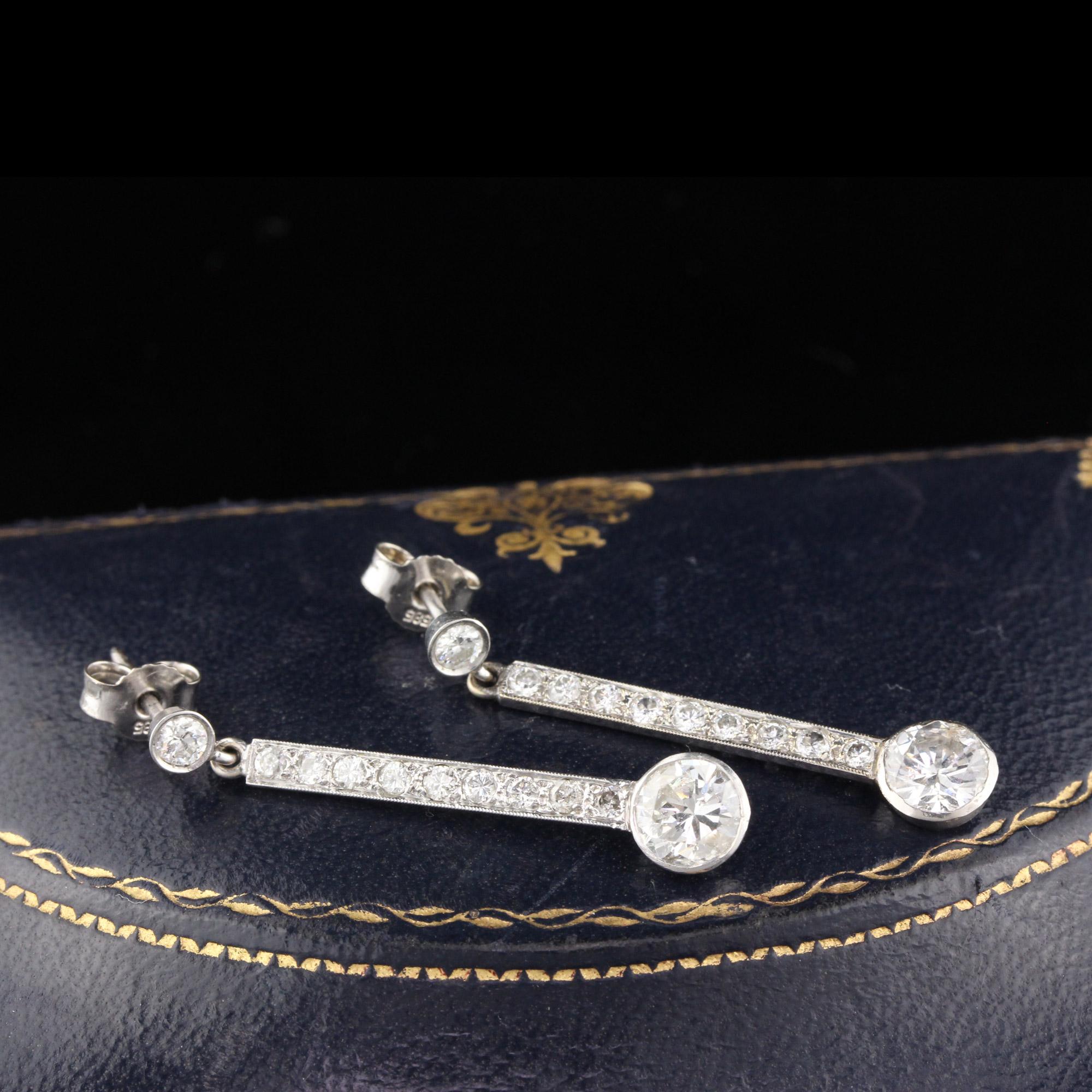 Beautiful diamond drop earrings done in 14K & 18K white gold with two old european cut diamonds at the bottom.

Metal: Platinum

Weight: 3 Grams

Diamond Weight: Approximately 2.40 cts 

Diamond Color: J

Diamond Clarity: I1

Measurement: The