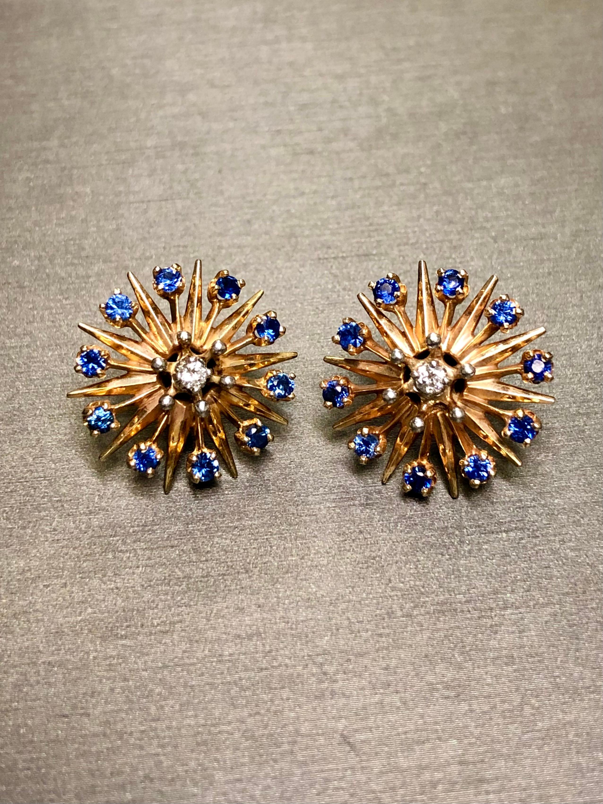 
A striking pair of original Art Deco earrings done in 14K and set with approximately .12cttw in G-H Vs1-2 round diamonds and 1cttw in no heat natural sapphires. Earrings have posts with friction backs. Sale is accompanied by the original GIA