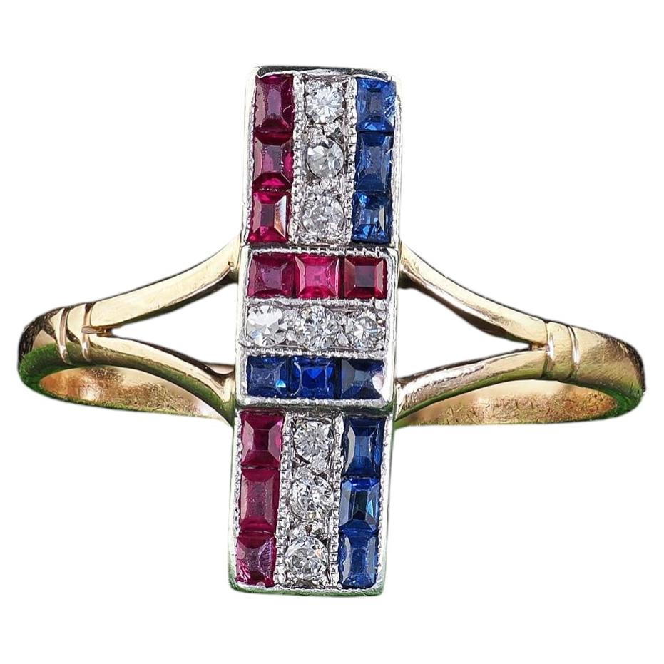 Anillo de barra antiguo de estilo Art Déco en oro de 14 quilates y platino con diamantes, rubíes y zafiros en venta