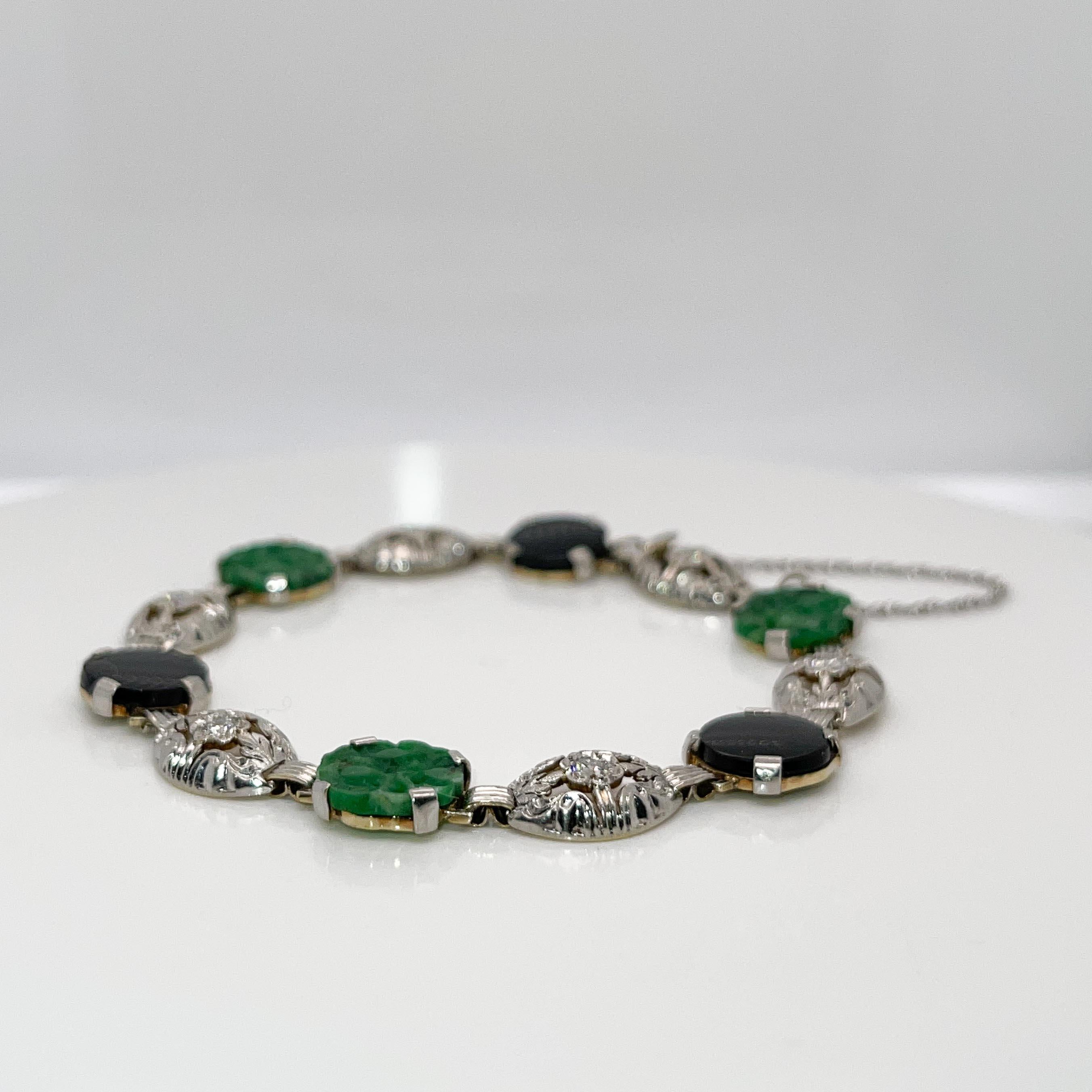 Antikes Art-Déco-Gliederarmband, 14 Karat Gold & grüne Jade, Onyx und Diamant im Zustand „Relativ gut“ im Angebot in Philadelphia, PA