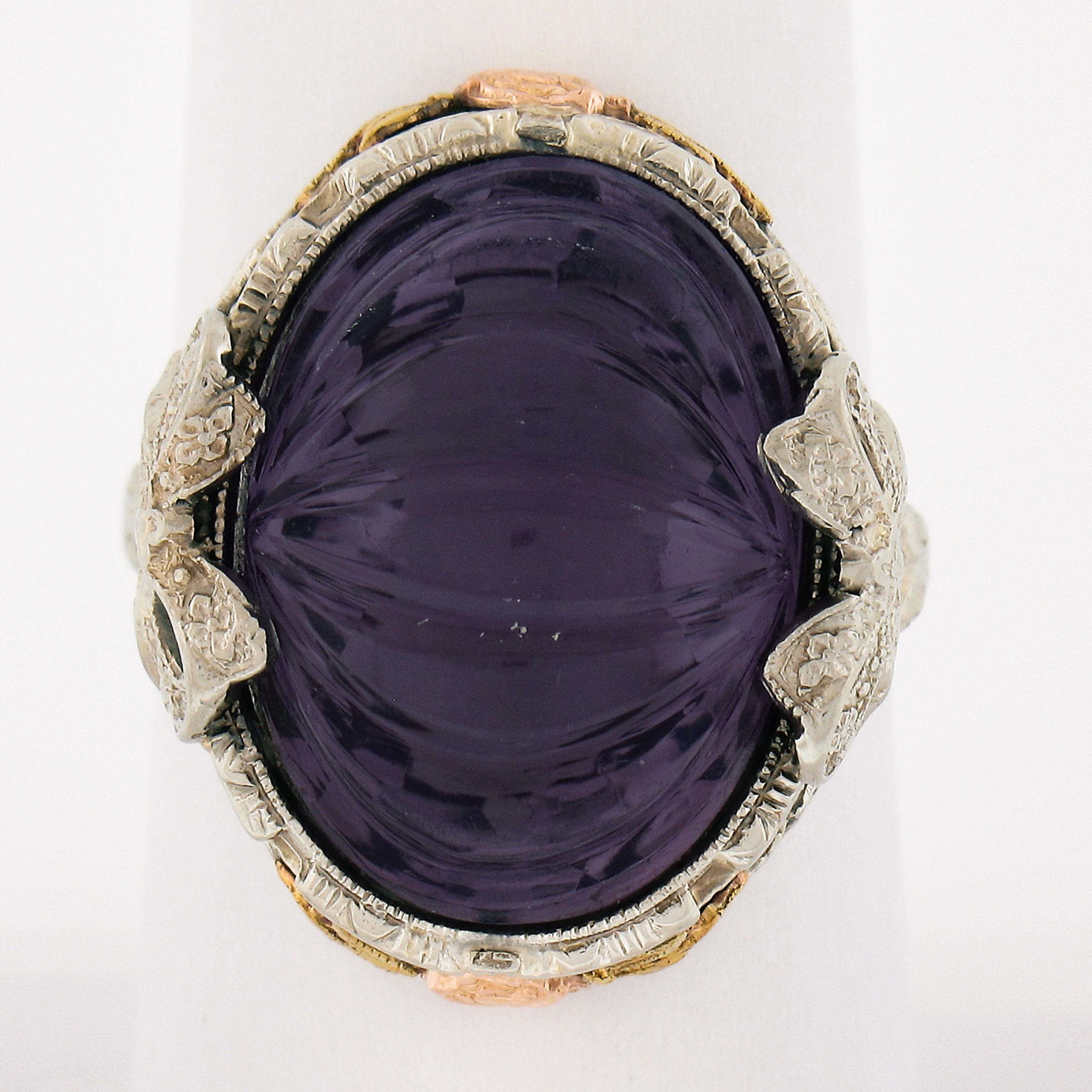 --Stone(s):--
(1) Natural Genuine Amethyst - Carved Oval Cut - Prong Set - Transparent Medium Purple Color - 18x12.8mm (approx.)

Material: Solid 14k White & Green Gold w/ Rose Gold Accents 
Weight: 7.02 Grams
Ring Size: 8.0 (Fitted on a finger. We