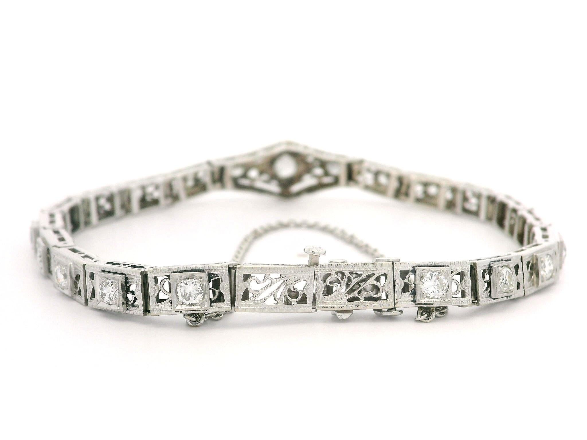 –Stone(s)–
(21) Natural Genuine Diamonds - Old European Cut - Pave Set - G-J Color - VS2-I1 Clarity - 1.39ctw (approx.)

Material: Solid 14k White Gold w/ Platinum Top Diamond Area
Weight: 10.30 Grams
Type: Filigree open work Line Link
Length: Will