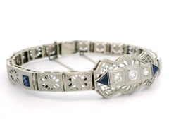 Bracciale aperto in filigrana in oro 14k e platino con diamanti e zaffiri