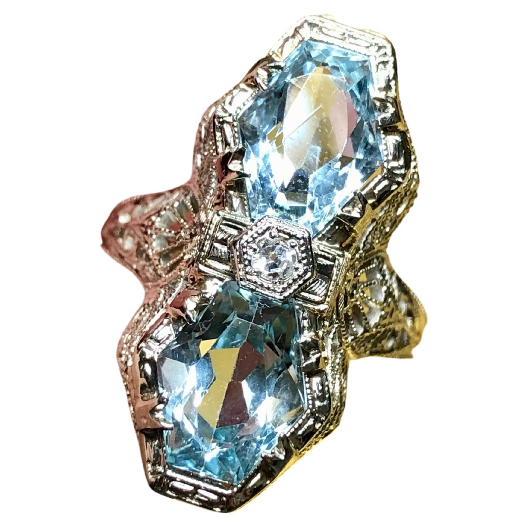 Ancienne bague cocktail filigrane Art déco 14 carats aigue-marine diamant North South
