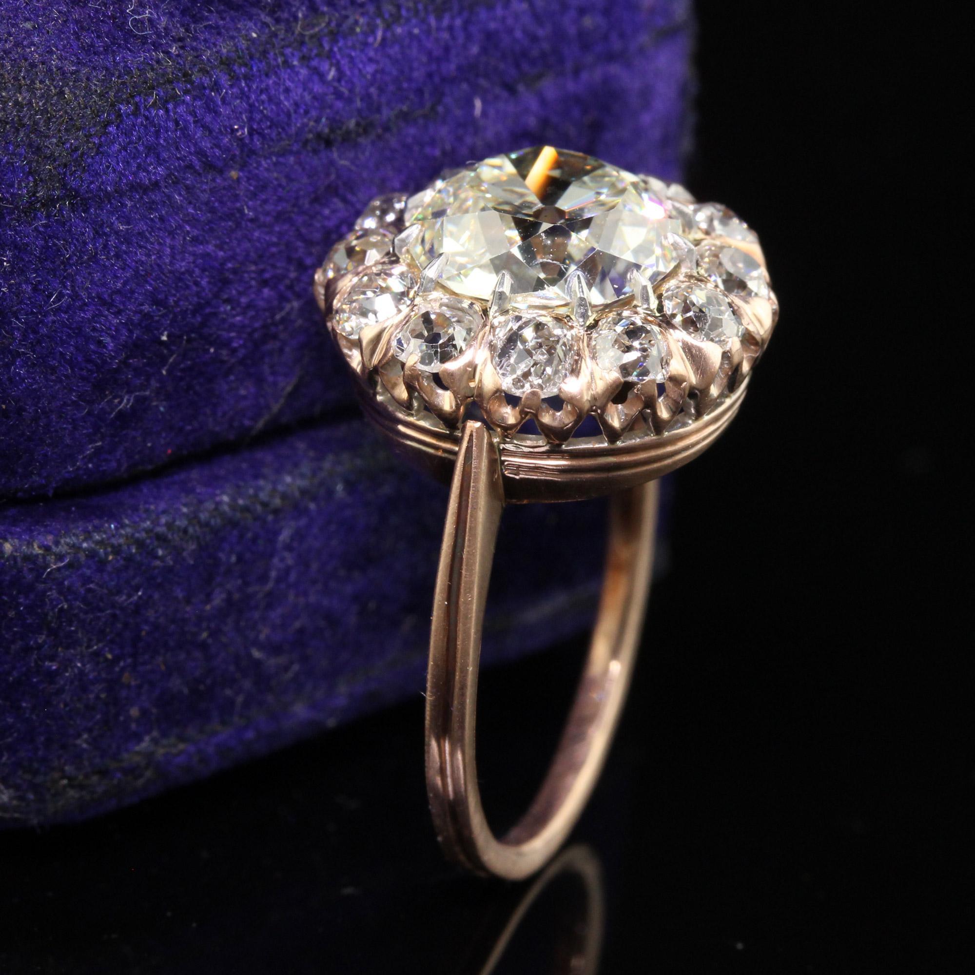 Art déco Bague de fiançailles édouardienne ancienne en or rose 14 carats avec halo de diamants européens anciens - GIA en vente