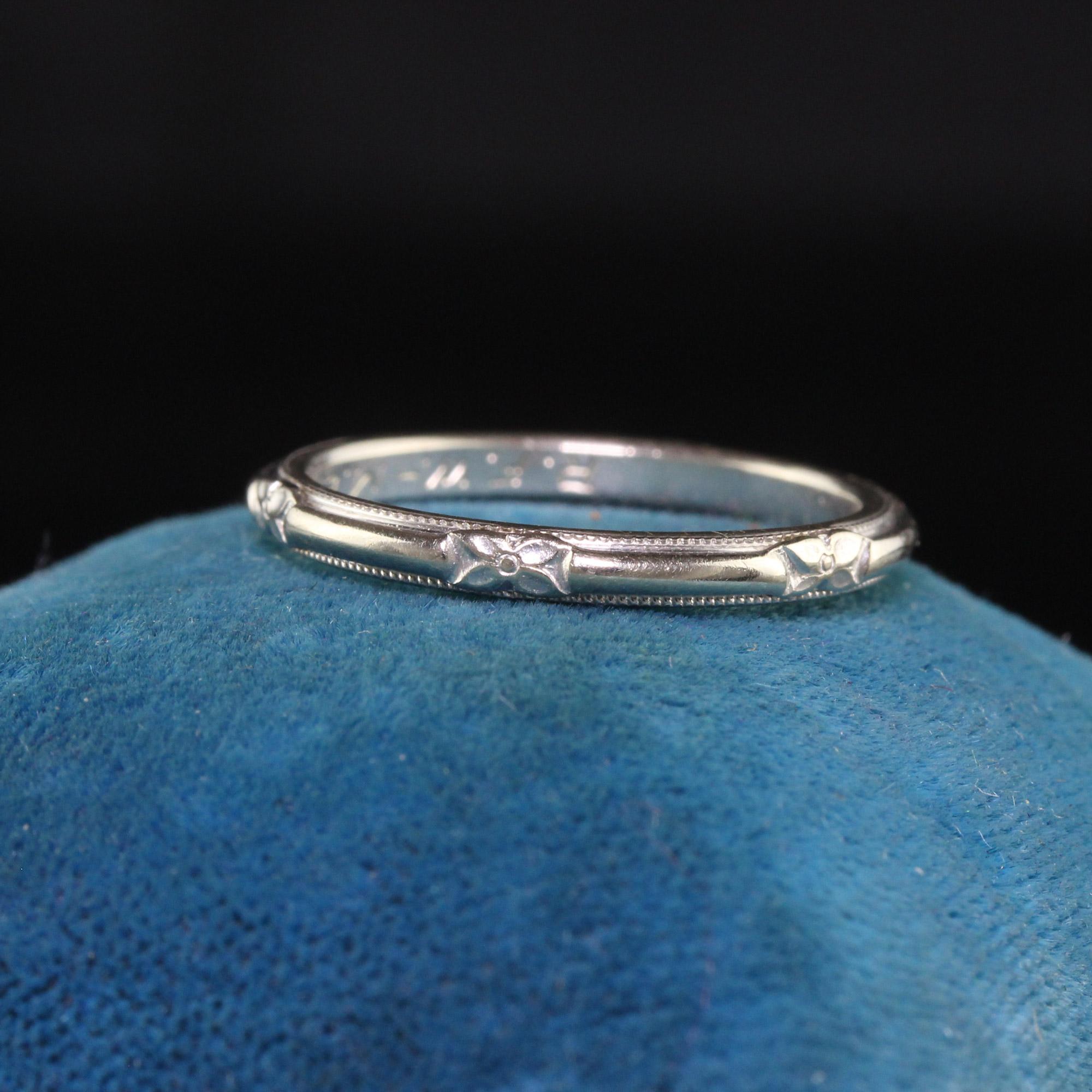 Beautiful Antique Art Deco 14K White Gold Art Carved Engraved Wedding Band. This gorgeous wedding band is crafted in 14k white gold. There are engravings going around the entire ring and it is in great condition. The inside of the band is engraved