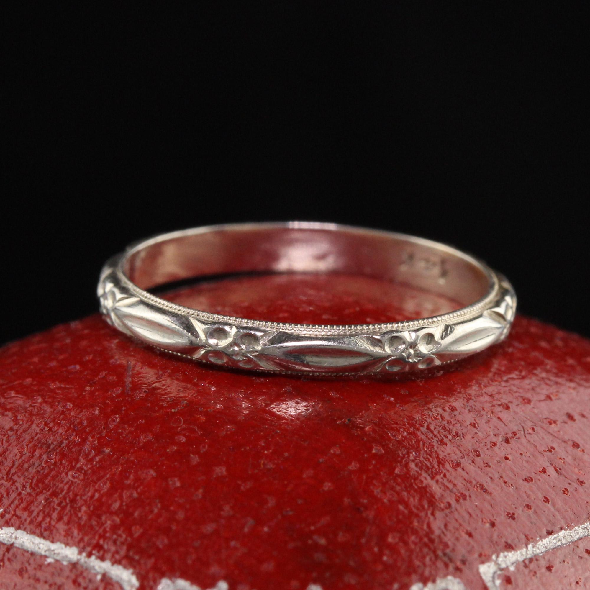Beautiful Antique Art Deco 14K White Gold Engraved Wedding Band - Size 5 1/4. This beautiful band is deeply engraved on the entire band and is in great condition.

Item #R0973

Metal: 14K White Gold

Weight: 1.2 Grams

Ring Size: 5
