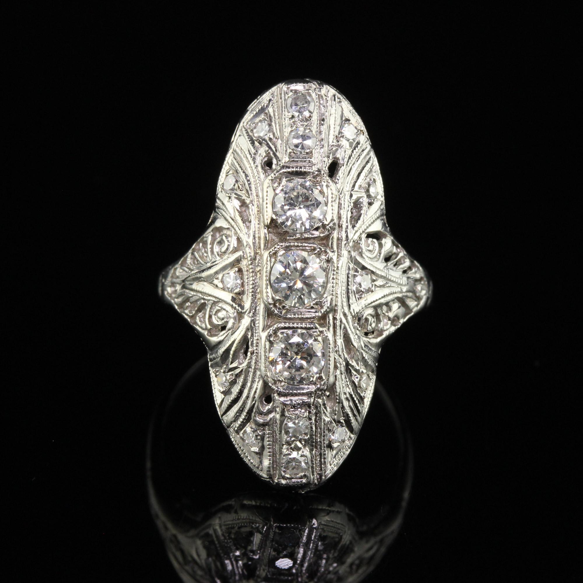Antique Art Deco 14K White Gold Old Cut Diamond Filigree Shield Ring In Good Condition For Sale In Great Neck, NY