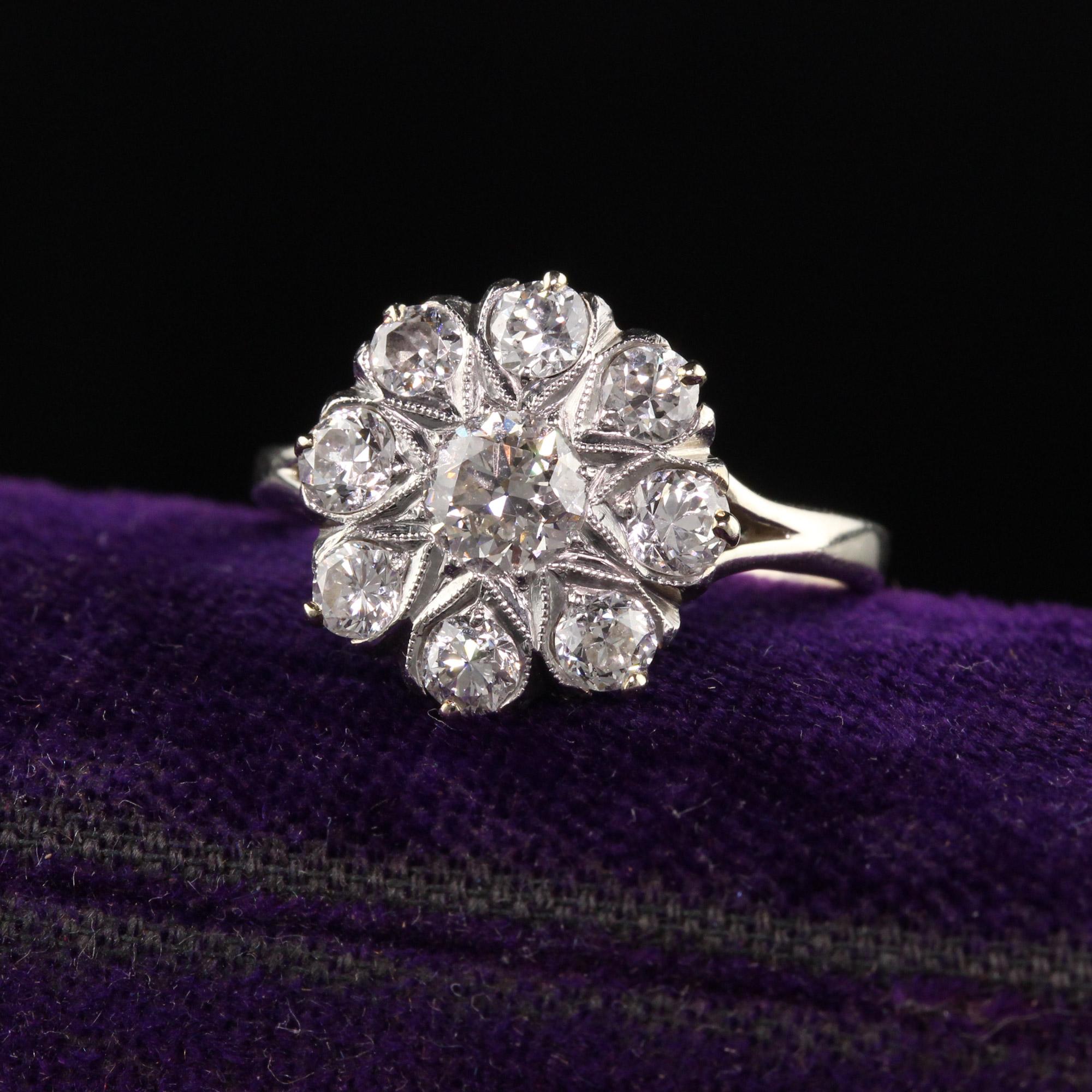 Beautiful Vintage 14K White Gold Old Euro Diamond Cluster Engagement Ring. This gorgeous ring is crafted in 14k white gold. The top has old european cut diamonds set in a flower pattern and sits low on the finger. It is in great shape and very