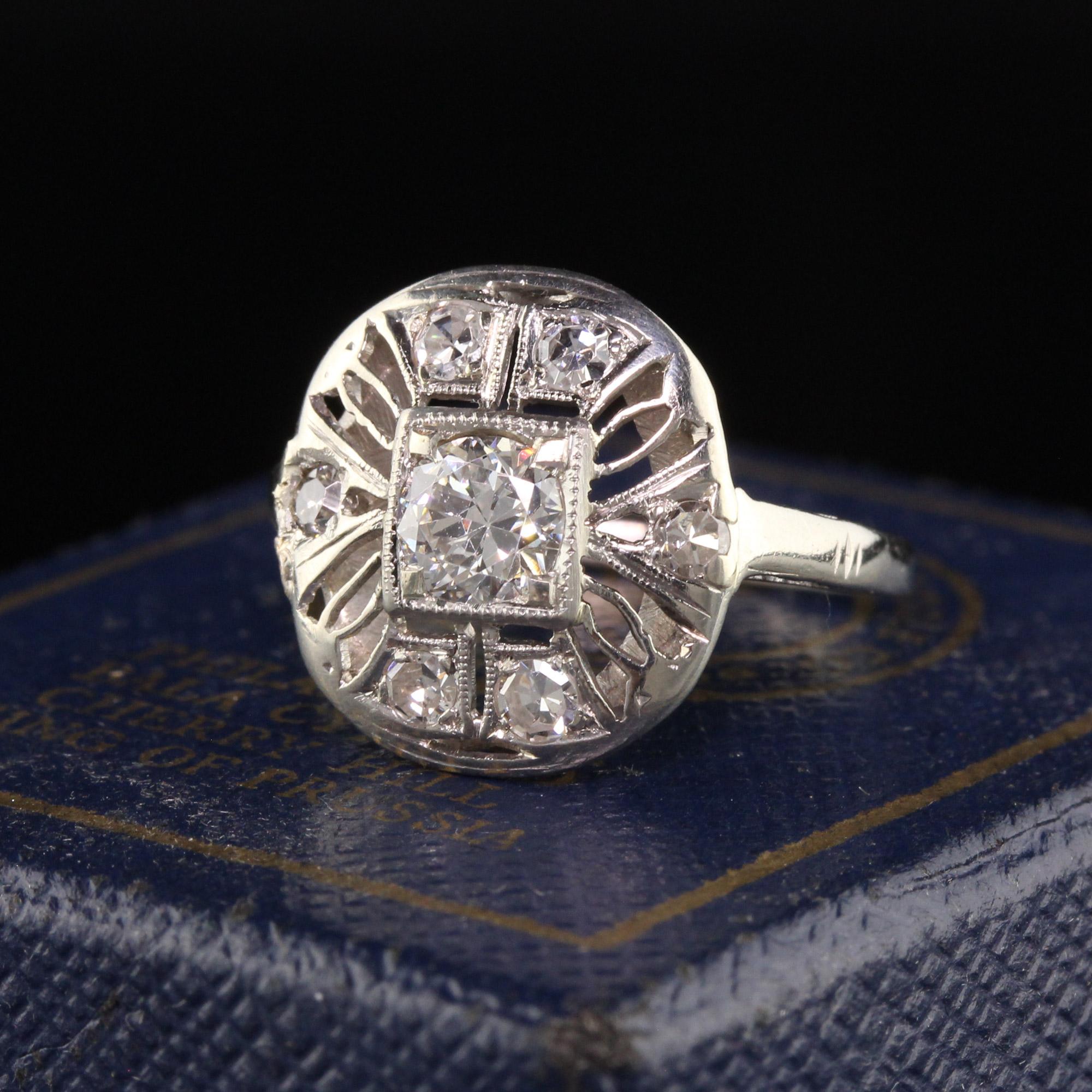 Beautiful Antique Art Deco 14K White Gold Old European Cut Diamond Engagement Ring. This gorgeous engagement ring is crafted in 14K white gold and has gorgeous filigree work on the top of the ring.

Item #R1212

Metal: 14K White Gold

Weight: 1.8