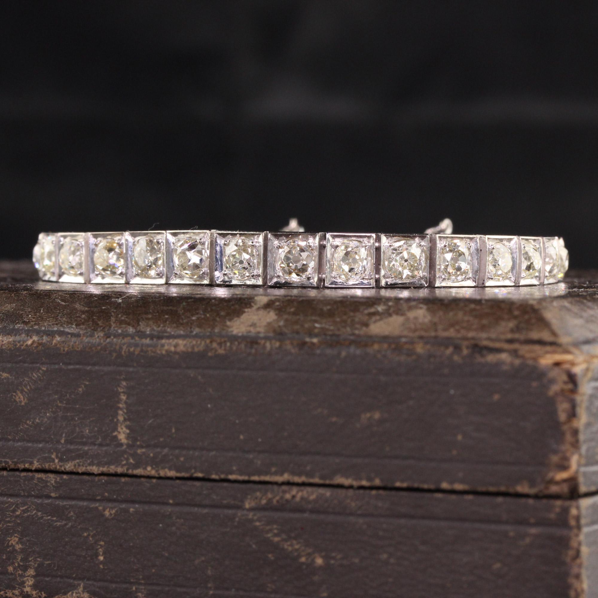 Antique Art Deco 14K White Gold Old Mine Cut Diamond Line Bracelet In Good Condition For Sale In Great Neck, NY