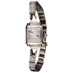 Montre ancienne Art Déco en or blanc 14 carats Perregaux à diamants