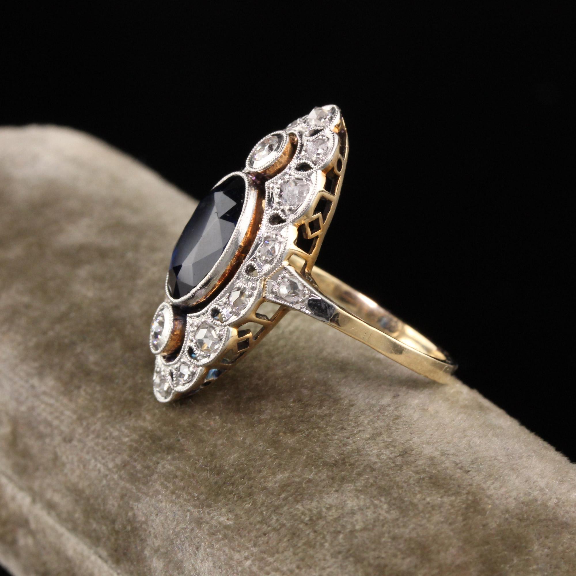 Beautiful Antique Art Deco 14K Yellow Gold and Platinum Diamond and Sapphire Ring. This gorgeous ring features an approximate 3 ct oval natural sapphire in the center of an incredible mounting. The sapphire is on the darker side of color and is