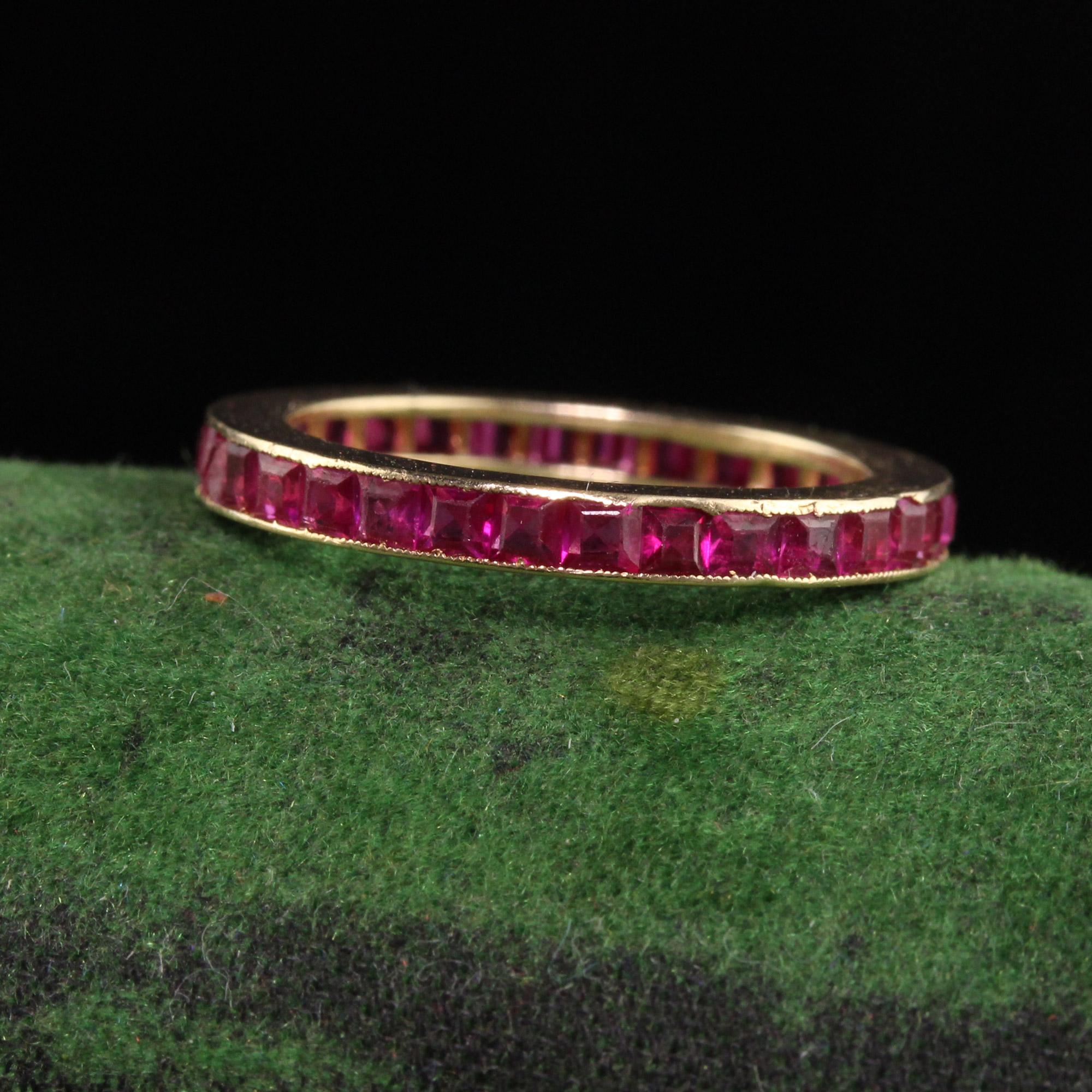 Beautiful Antique Art Deco 14K Yellow Gold Burma Ruby Eternity Band - Size 4 3/4. This gorgeous band has square Burmese rubies set all the way around the band and is in good condition. The rubies are very bright and glow.

Item #R1057

Metal: 14K