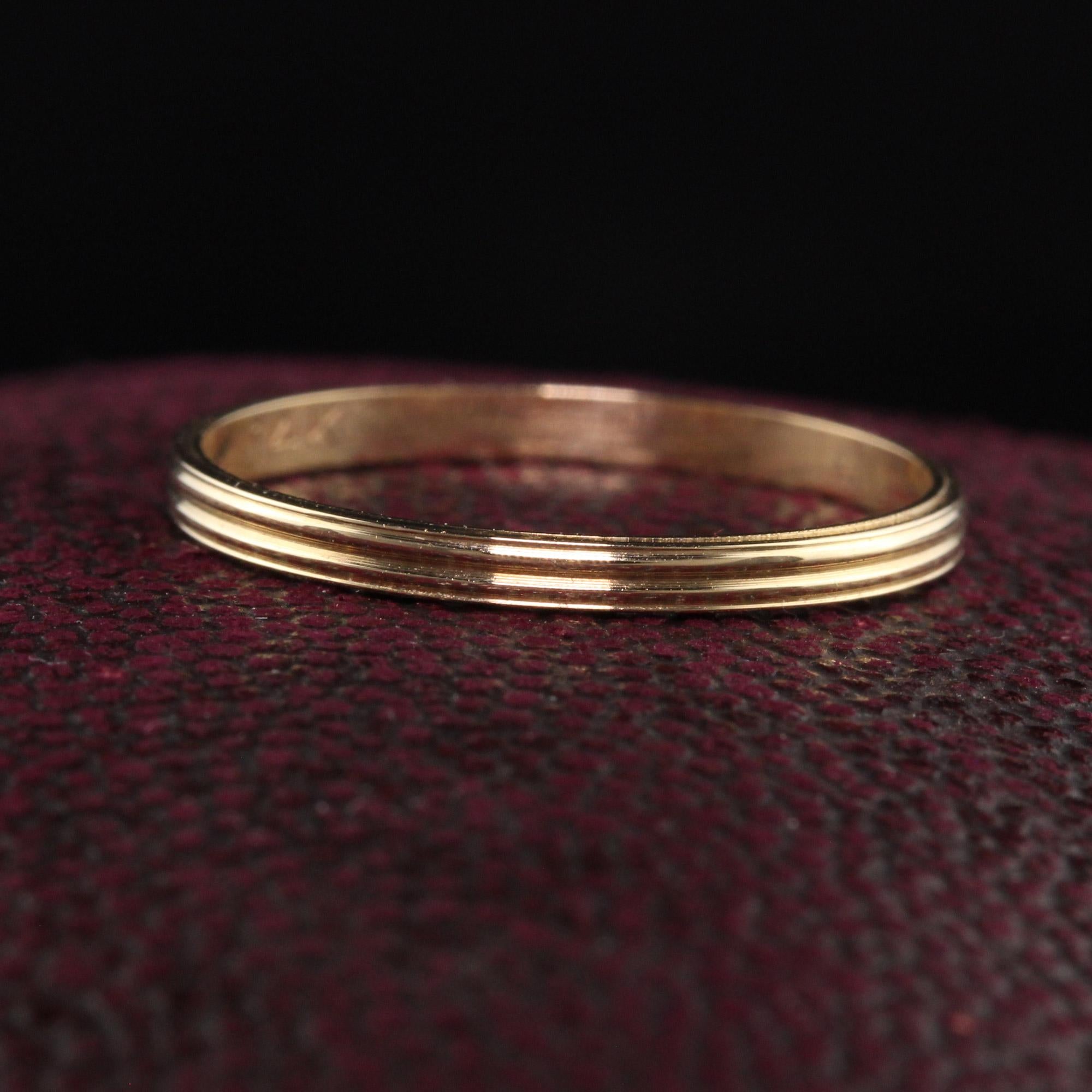 Beautiful Antique Art Deco 14K Yellow Gold Classic Grooved Wedding Band. This classic wedding band is grooved on the top and is in amazing condition. It can be stacked with other gold bands as well.

Item #R1009

Metal: 14K Yellow Gold

Weight: 1.1