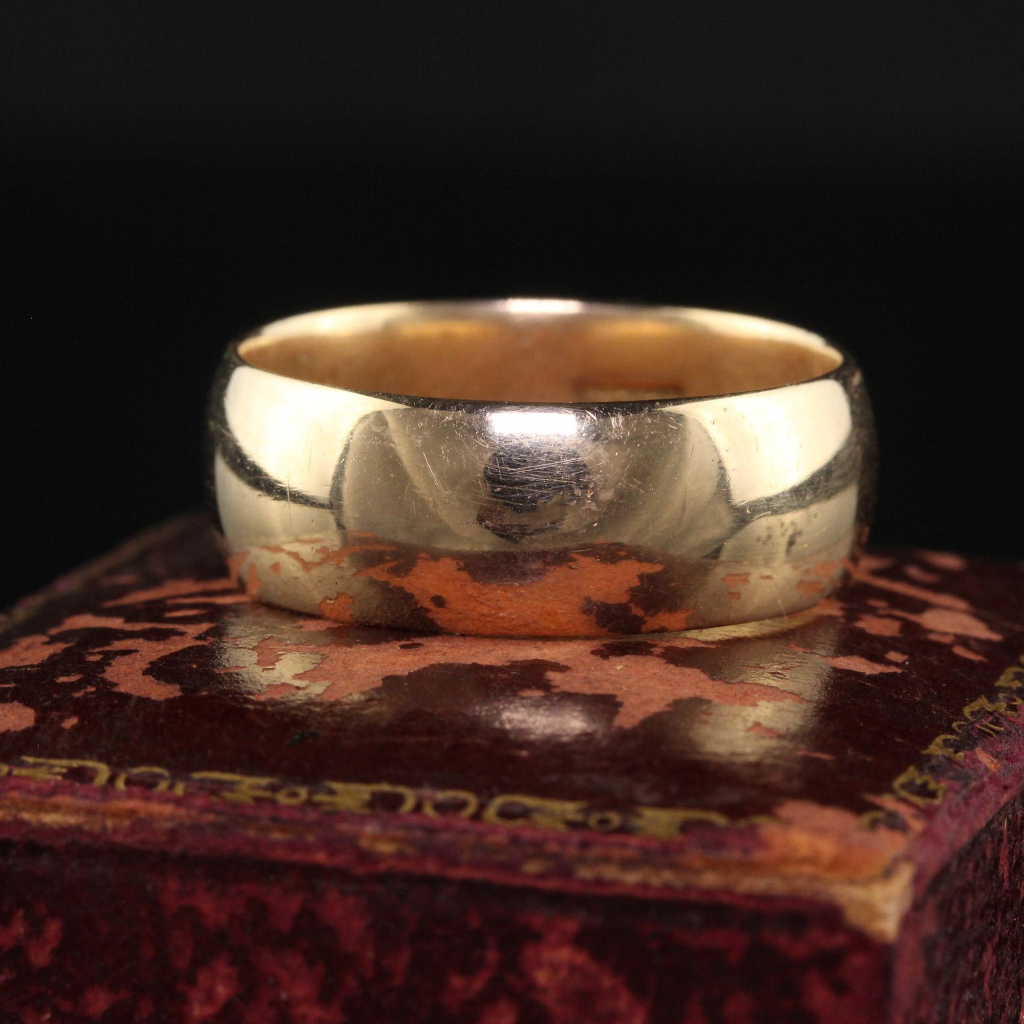 Beautiful Antique Art Deco 14K Yellow Gold Classic Wide Wedding Band - Size 9 3/4. This gorgeous wedding band is crafted in 14k yellow gold. The band features a wide band with a gorgeous patina on it due to its age. The ring is in great condition