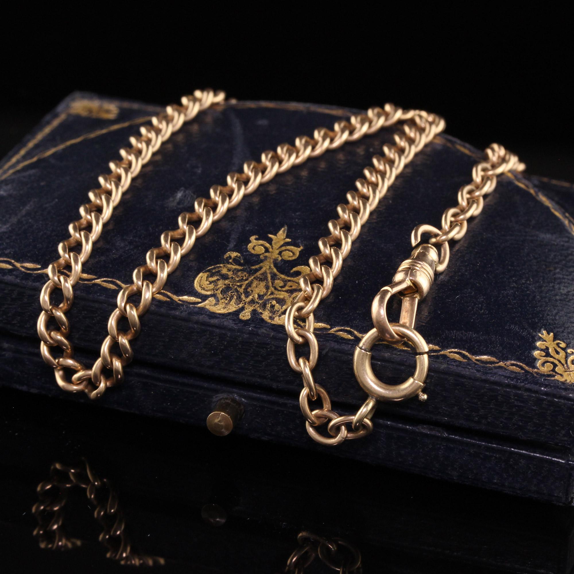 Beautiful Antique Art Deco 14K Yellow Gold Cuban Link Watch Fob Necklace. This classic necklace is crafted in 14k yellow gold. The necklace is in great condition and has a beautiful dark gold patina on it that make it look slightly rosy in color.