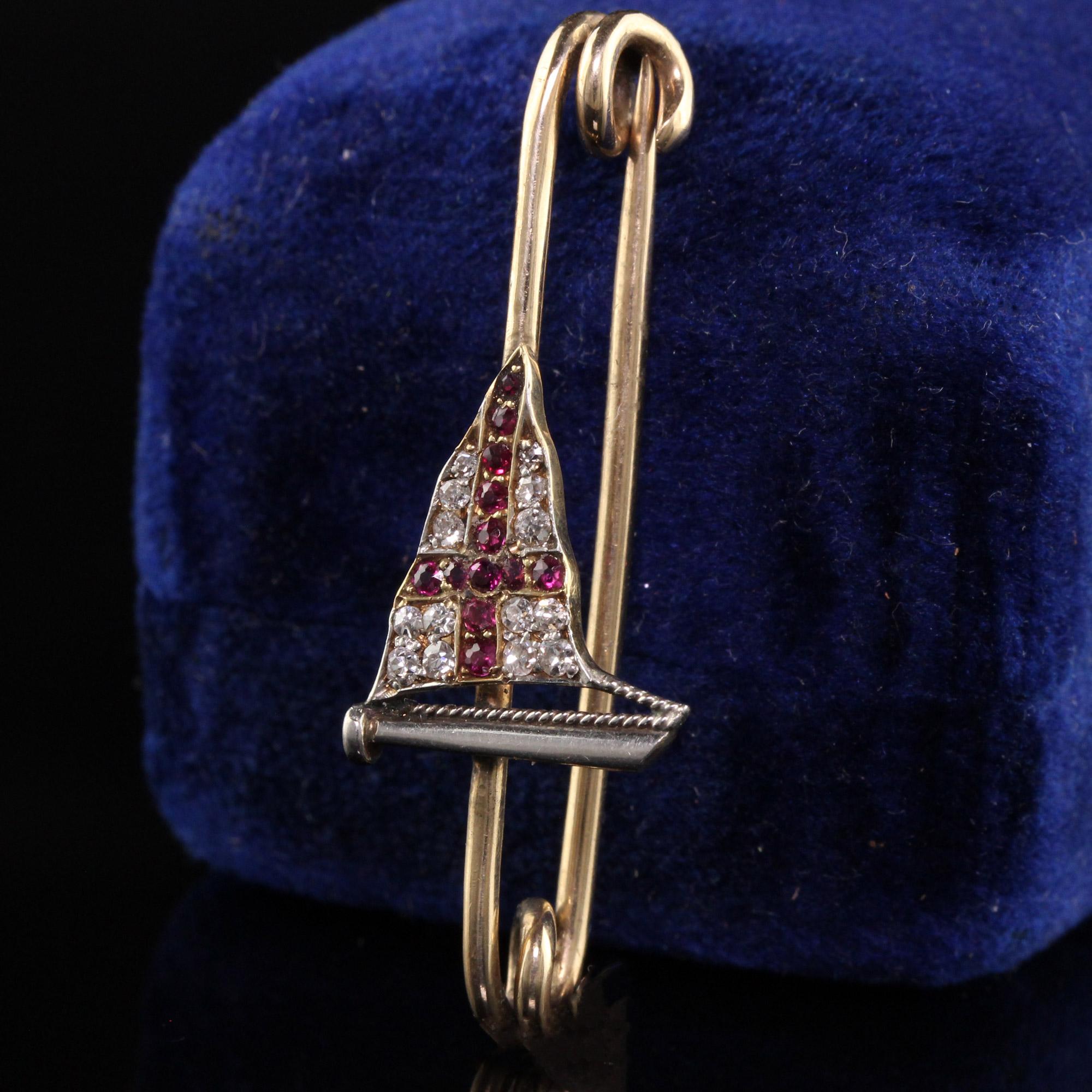 Beautiful Antique Art Deco 14K Yellow Gold Diamond and Ruby Sailboat/Flag Pin. This amazing pin has diamonds and burmese rubies set in the sail of the boat and is in amazing condition.

Item #P0126

Metal: 14K Yellow Gold

Weight: 2.5