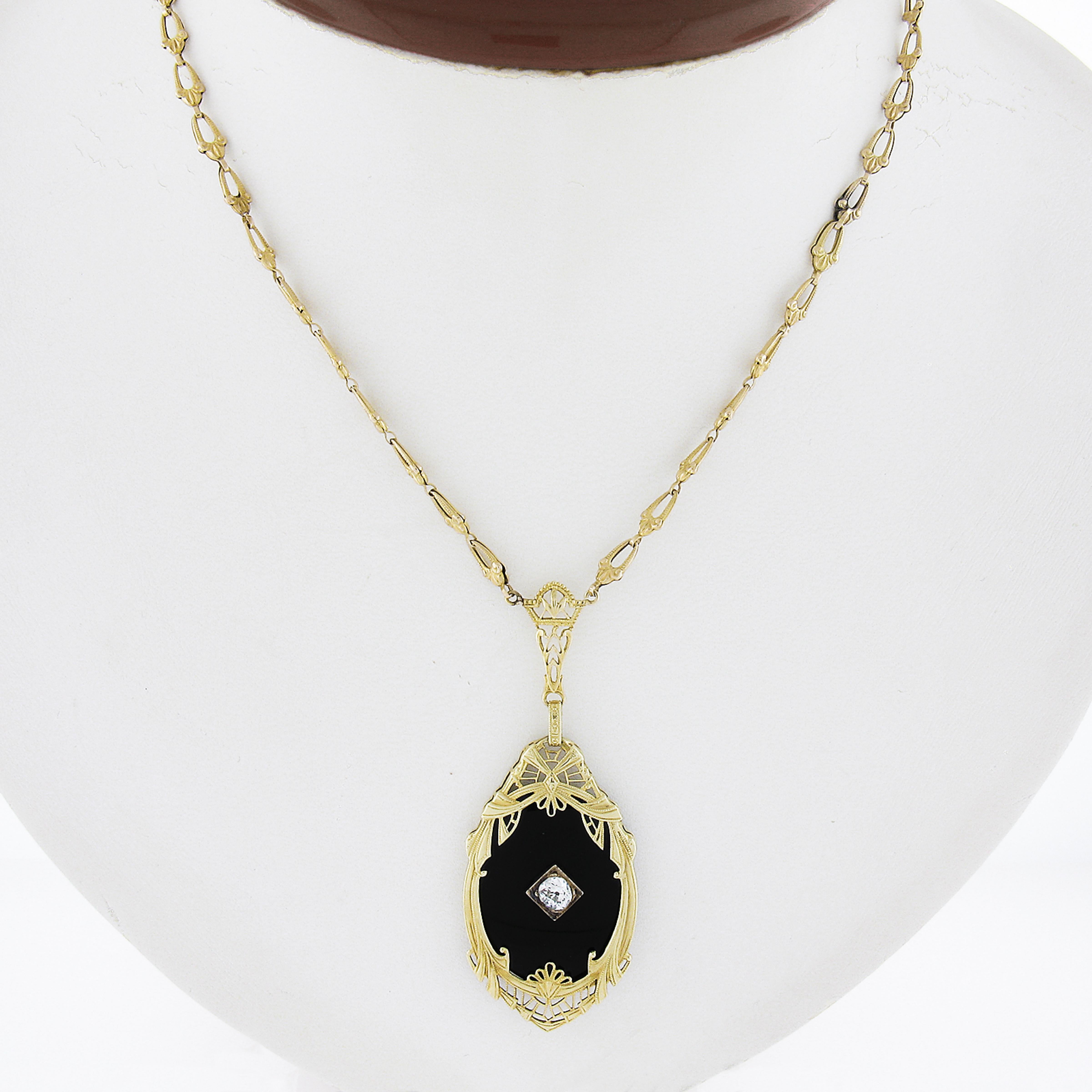 Very Rare to find these necklaces in yellow gold! Most were made in white and platinum. The yellow gold and black onyx combined with the masterful Art Deco Workmanship is truly something special! Enjoy!

--Stone(s):--
(1) Natural Genuine Black Onyx
