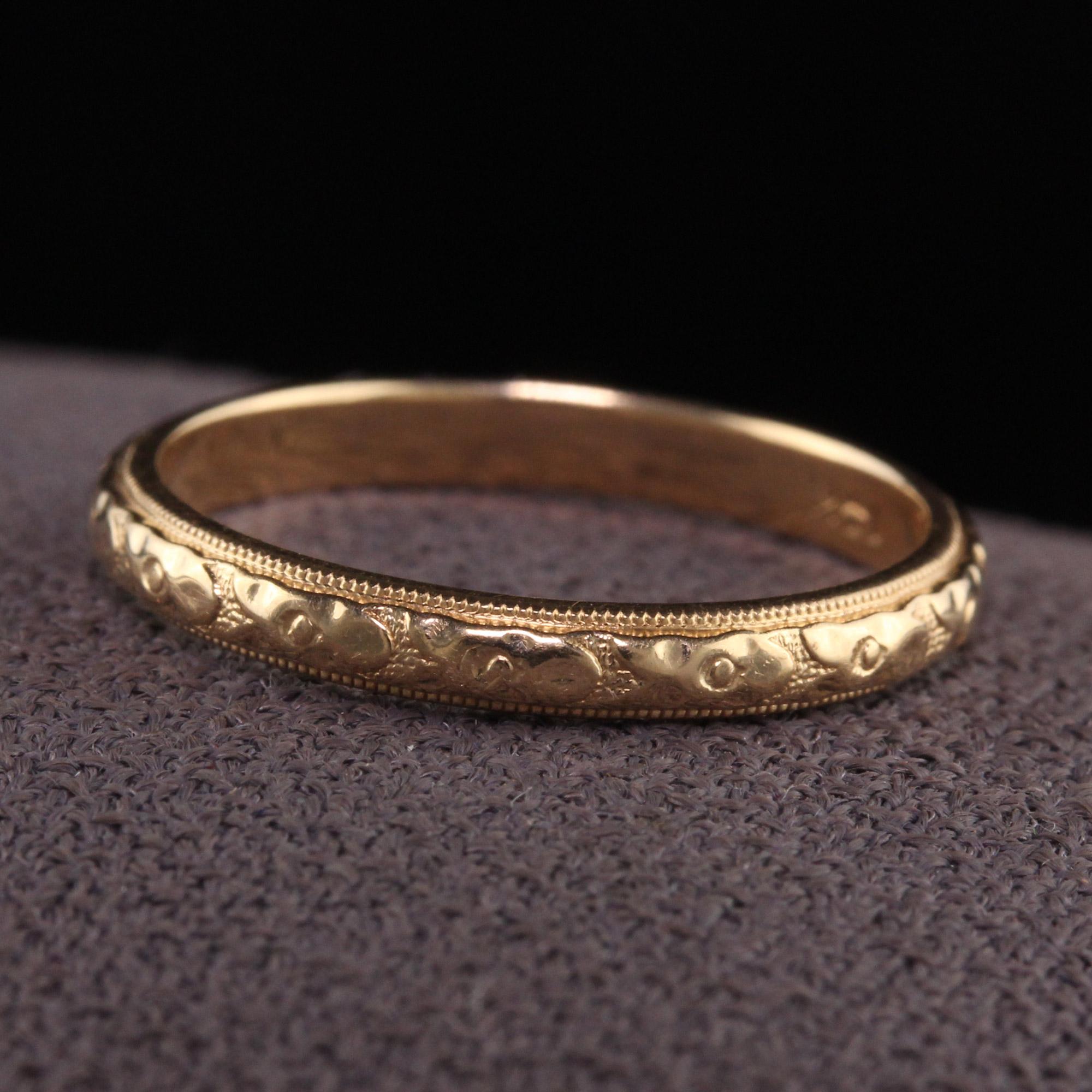Beautiful Antique Antique Art Deco 14K Yellow Gold Engraved Wedding Band - Size 6 3/4. This amazing art deco wedding band is in great condition and has beautiful engravings going around the entire ring.

Item #R1026

Metal: 14K Yellow Gold

Weight: