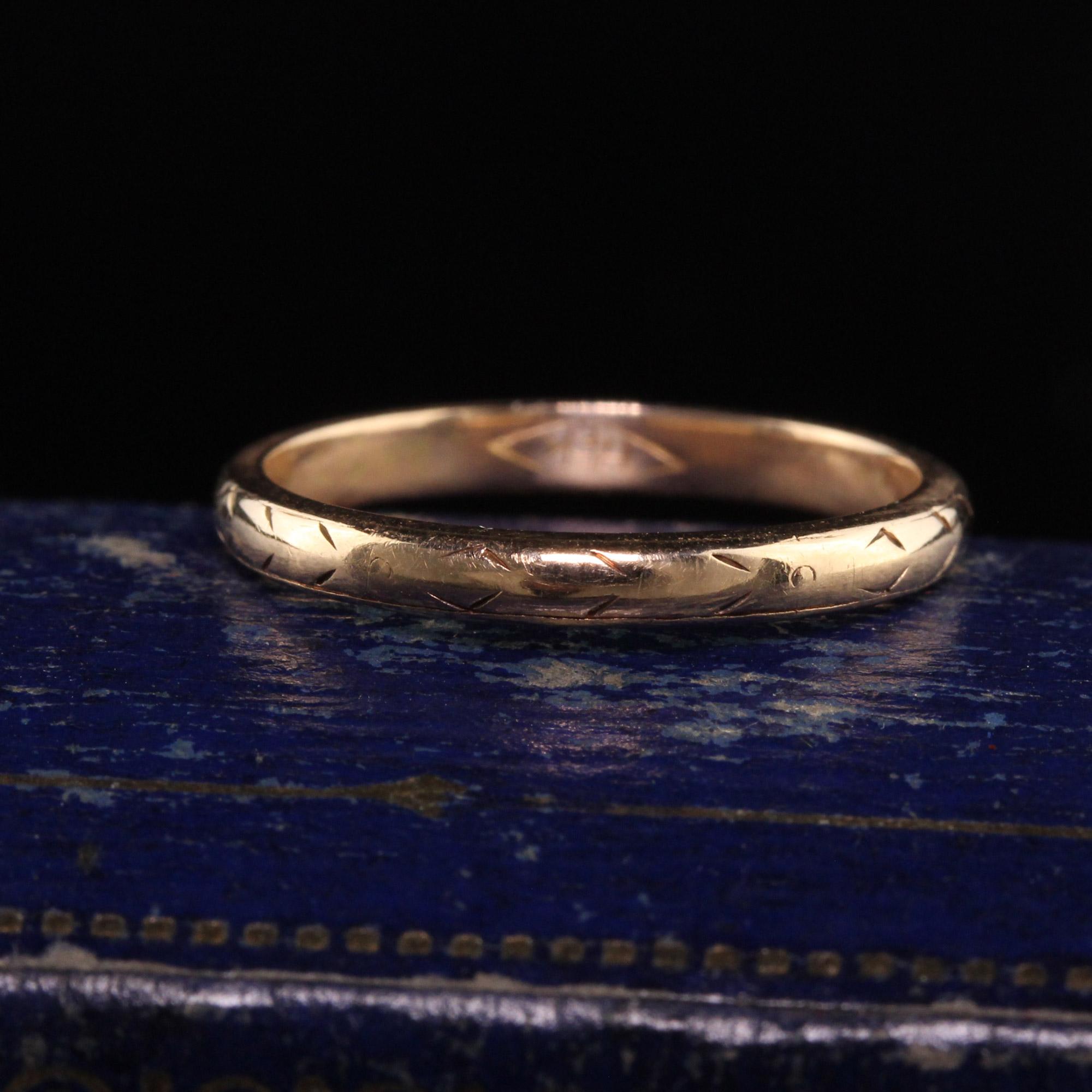 Beautiful Antique Art Deco 14K Yellow Gold Engraved Wedding Band - Size 6. This classic wedding band is in great condition and still has some faint engravings going around the entire band.

Item #R1048

Metal: 14K Yellow Gold

Weight: 2 Grams

Size: