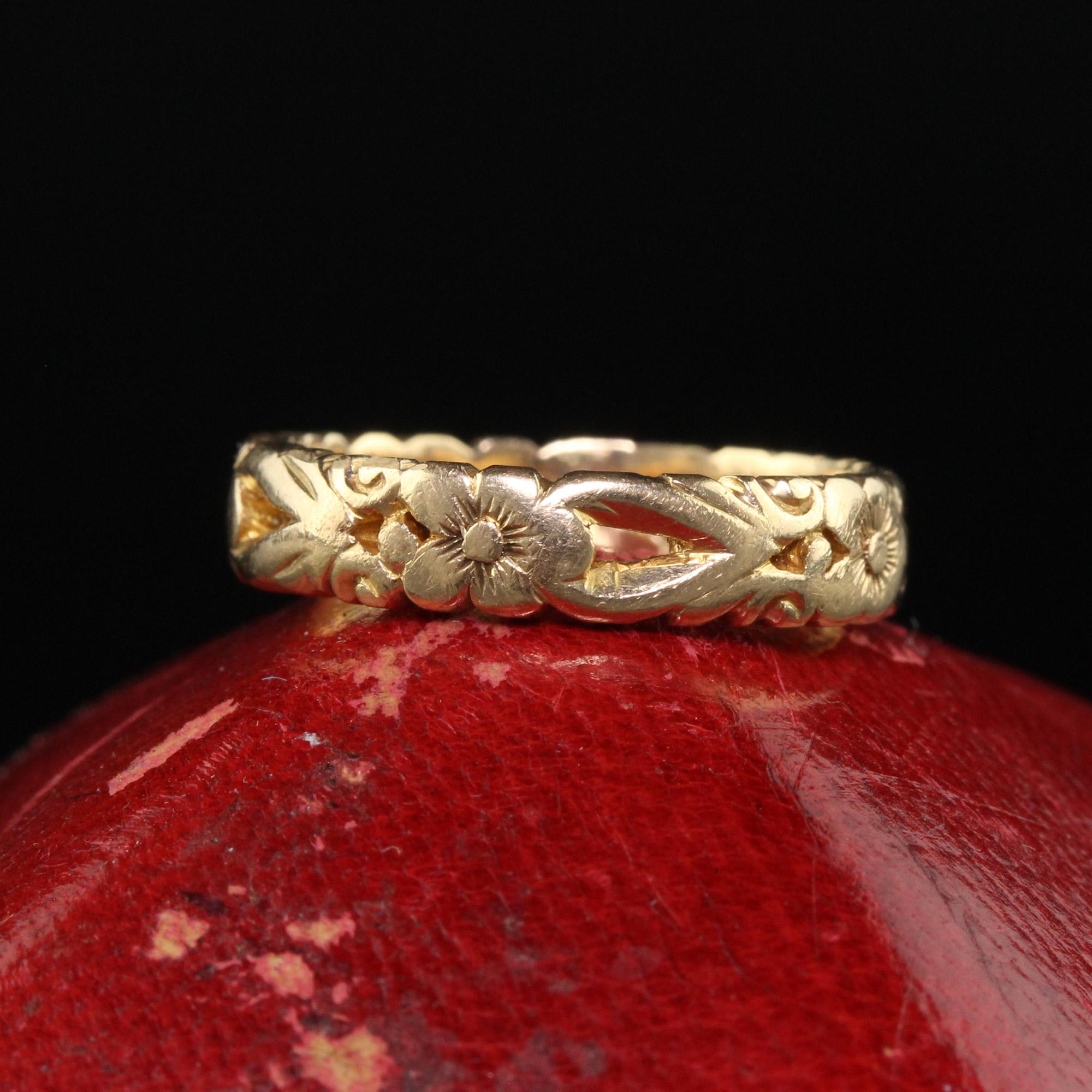 Beautiful Antique Art Deco 14K Yellow Gold Floral Engraved Wedding Band - Size 5. This beautiful Art Deco wedding band is crafted in 14k yellow gold. The ring features floral filigree engravings going around the entire ring and is in great