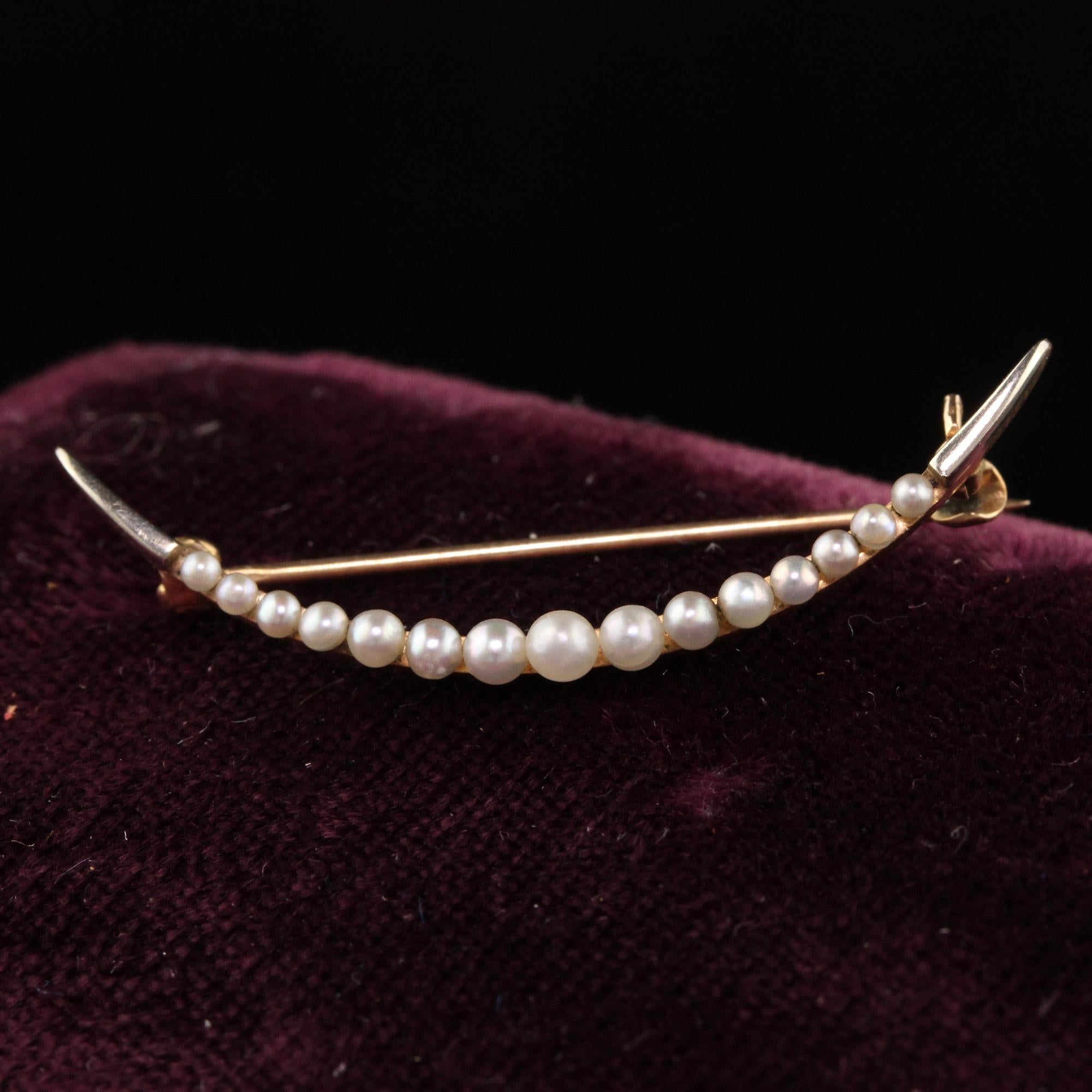 Beautiful Antique Art Deco 14K Yellow Gold Natural Pearl Crescent Pin. This gorgeous piece is crafted in 14k yellow gold. The pin has natural pearls across the front of the pin and is in great condition. This can also be converted to a necklace if