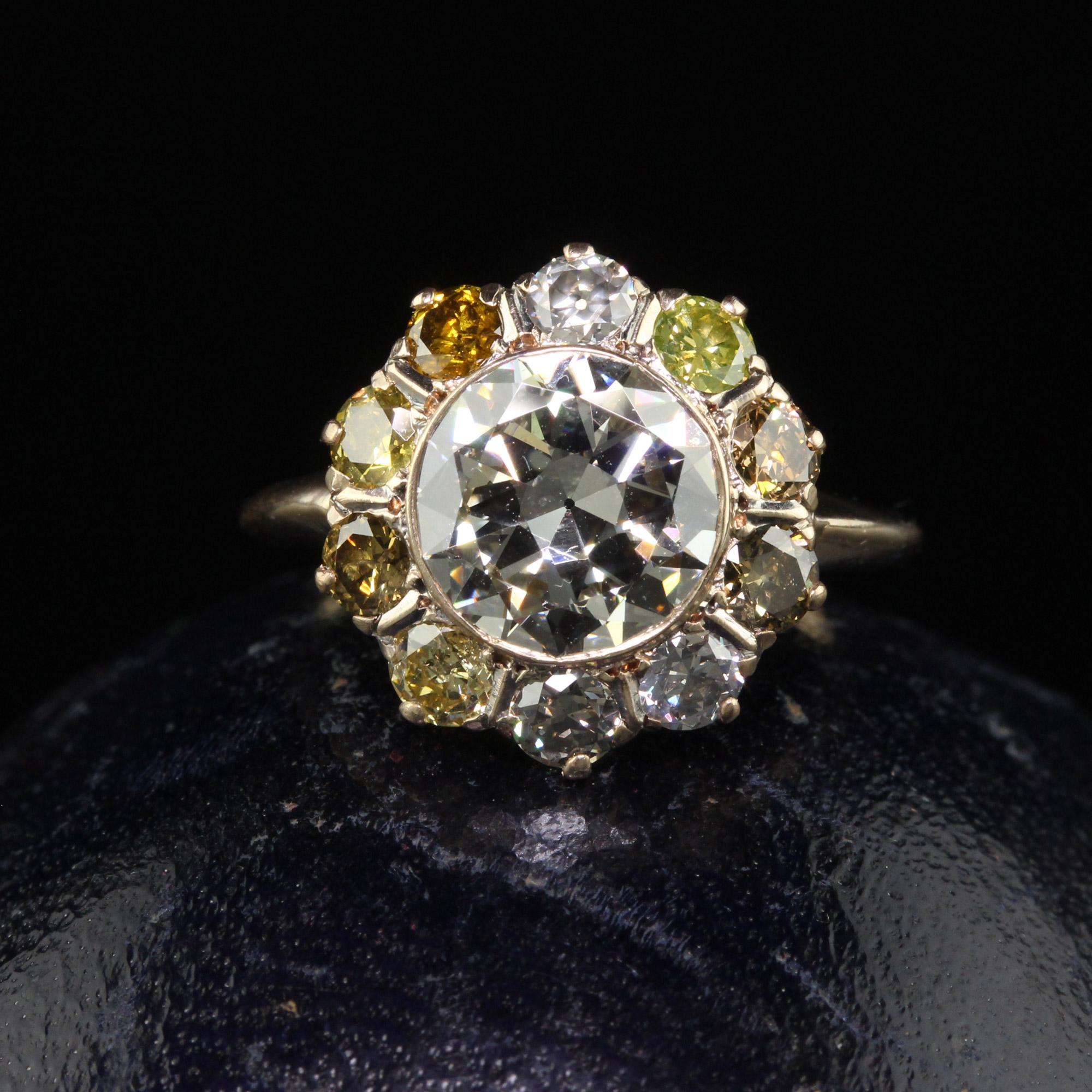 Beautiful Antique Art Deco 14K Yellow Gold Old Euro Fancy Color Halo Diamond Engagement Ring - GIA. This incredible engagement ring is crafted in 14k yellow gold. The center holds a Old European diamond and is surrounded by fancy colored old