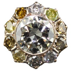 Ancienne bague de fiançailles Art déco en or jaune 14 carats avec halo de diamants de couleur européenne fantaisie