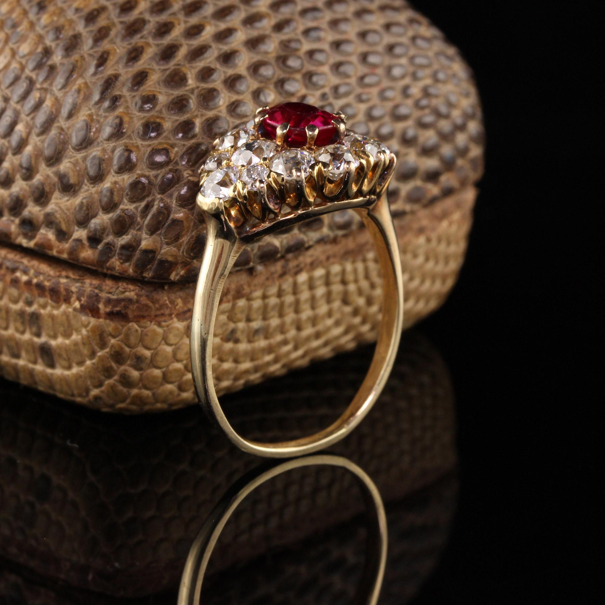 Beautiful Antique Art Deco 14K Yellow Gold Old European Diamond Ruby Ring. This amazing ring features chunky old european cut diamonds surrounding a synthetic ruby center stone. Synthetic rubies were commonly used in many antique pieces due to the