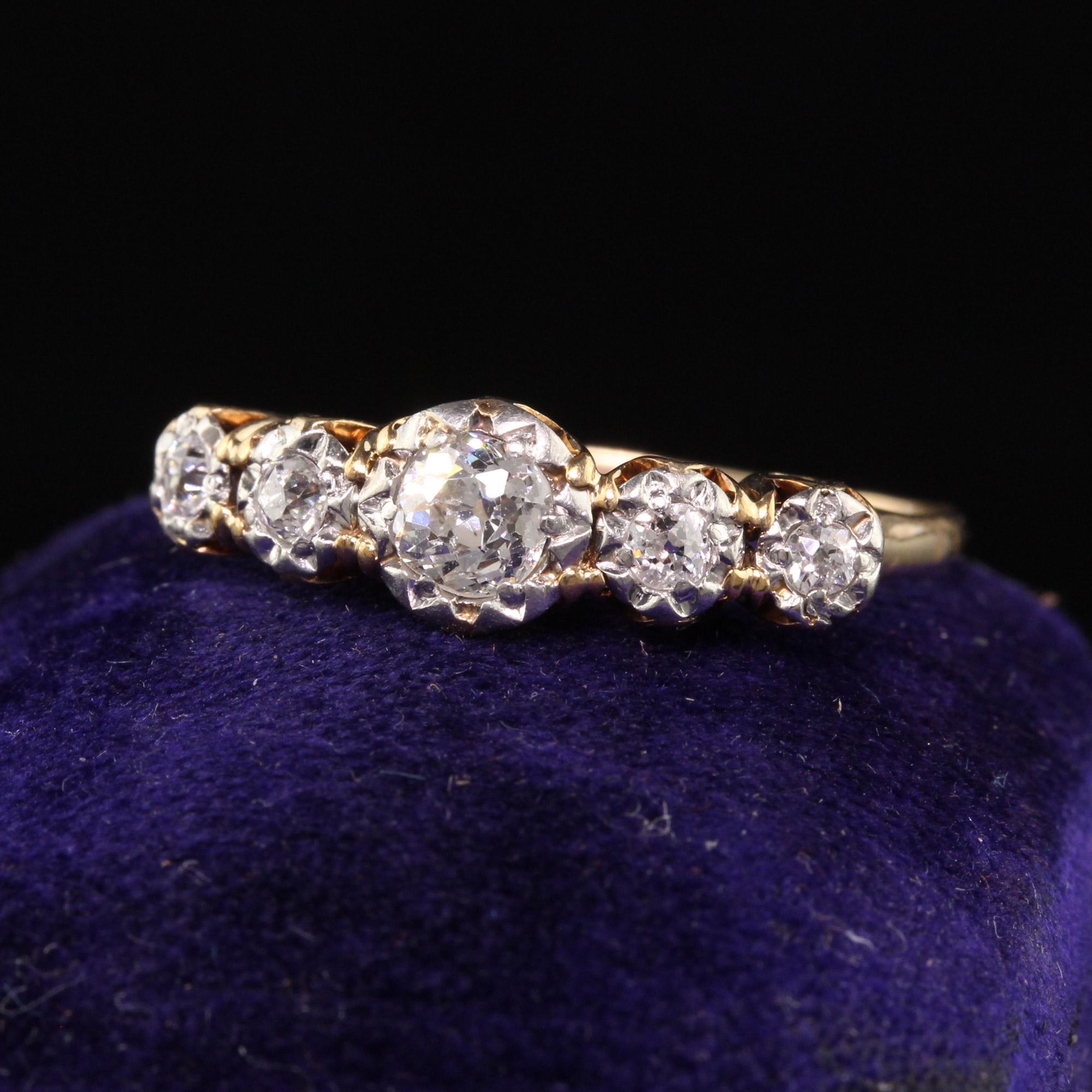 Beautiful Antique Art Deco 14K Yellow Gold Old Mine Diamond Five Stone Ring. This beautiful ring features 5 old mine cut diamonds in an art deco yellow gold setting.

Item #R1078

Metal: 14K Yellow Gold

Weight: 2.6 Grams

Size: 7 1/2

Diamonds: