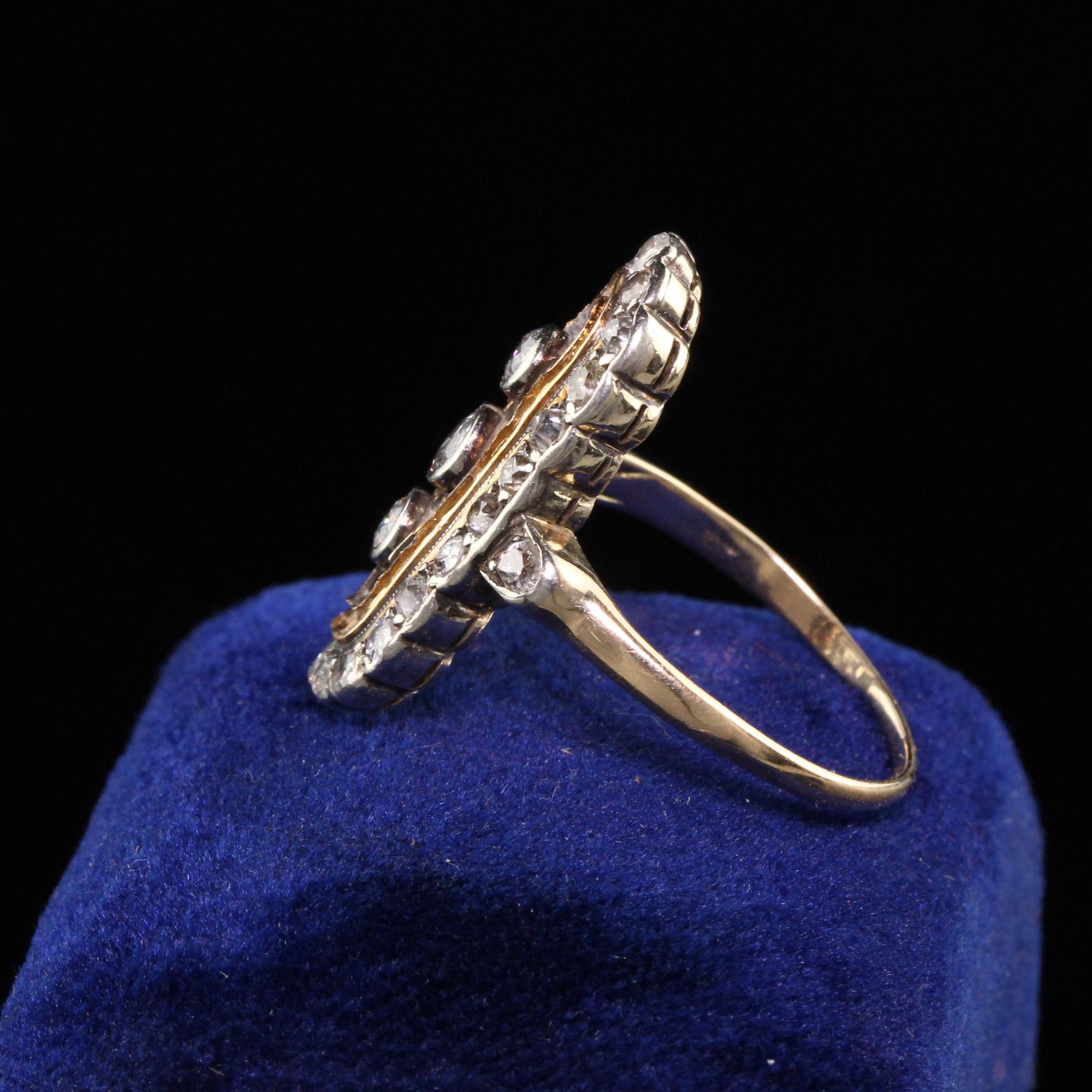 Beautiful Antique Art Deco 14K Yellow Gold Old Mine Diamond Shield Ring. This beautiful art deco ring has chunky old mine cut diamonds set in a yellow gold filigree ring.

Item #R0804

Metal: 14K Yellow Gold and Silver Top

Diamond: Approximately