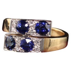 Bague bypass Art déco ancienne en or jaune 14 carats avec saphirs et diamants