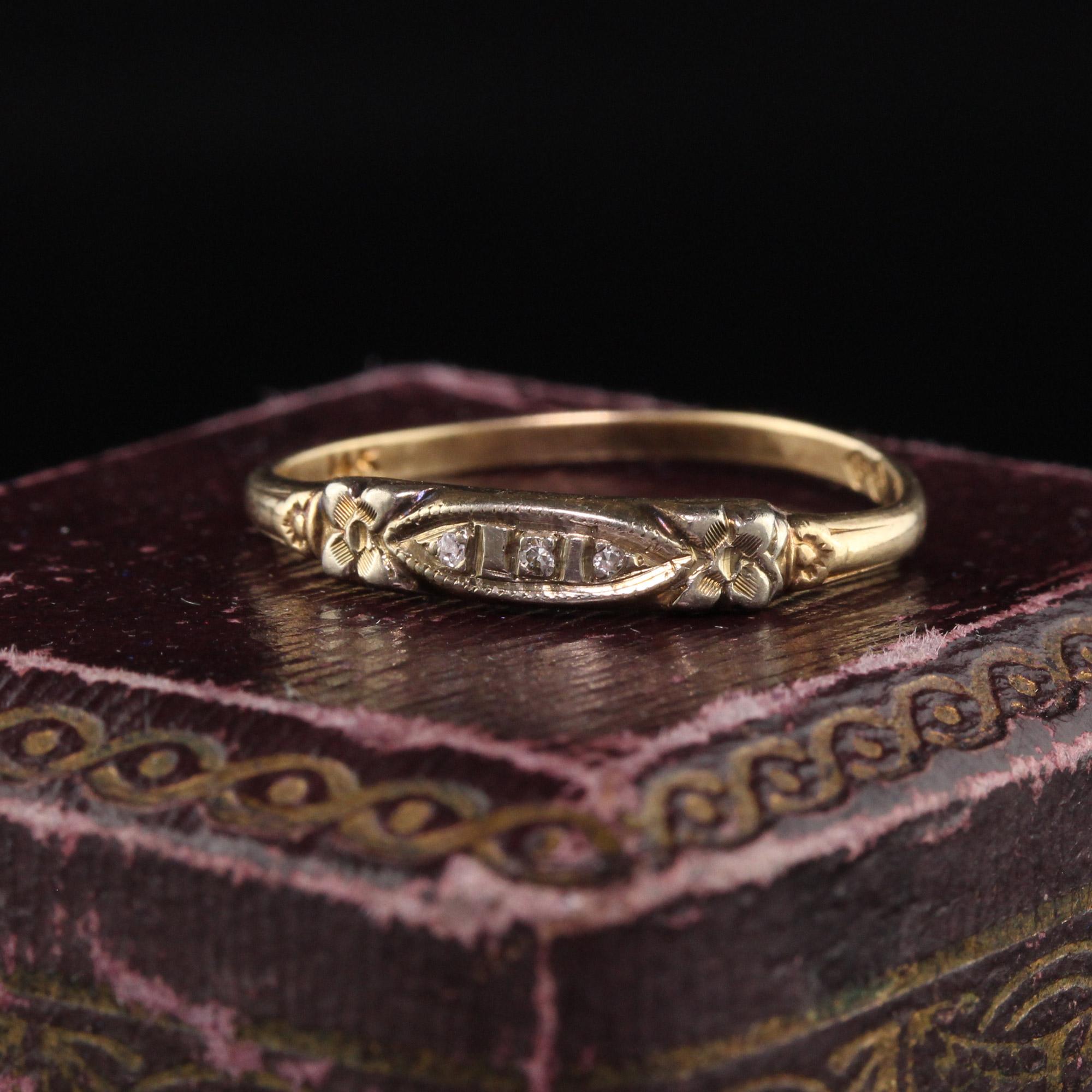 Beautiful Antique Art Deco 14K Yellow Gold Single Cut Diamond Wedding Band. This beautiful wedding band is crafted in 14k yellow gold. There are three tiny single cut diamonds on the top of this pretty wedding band. It has some blossom engravings on